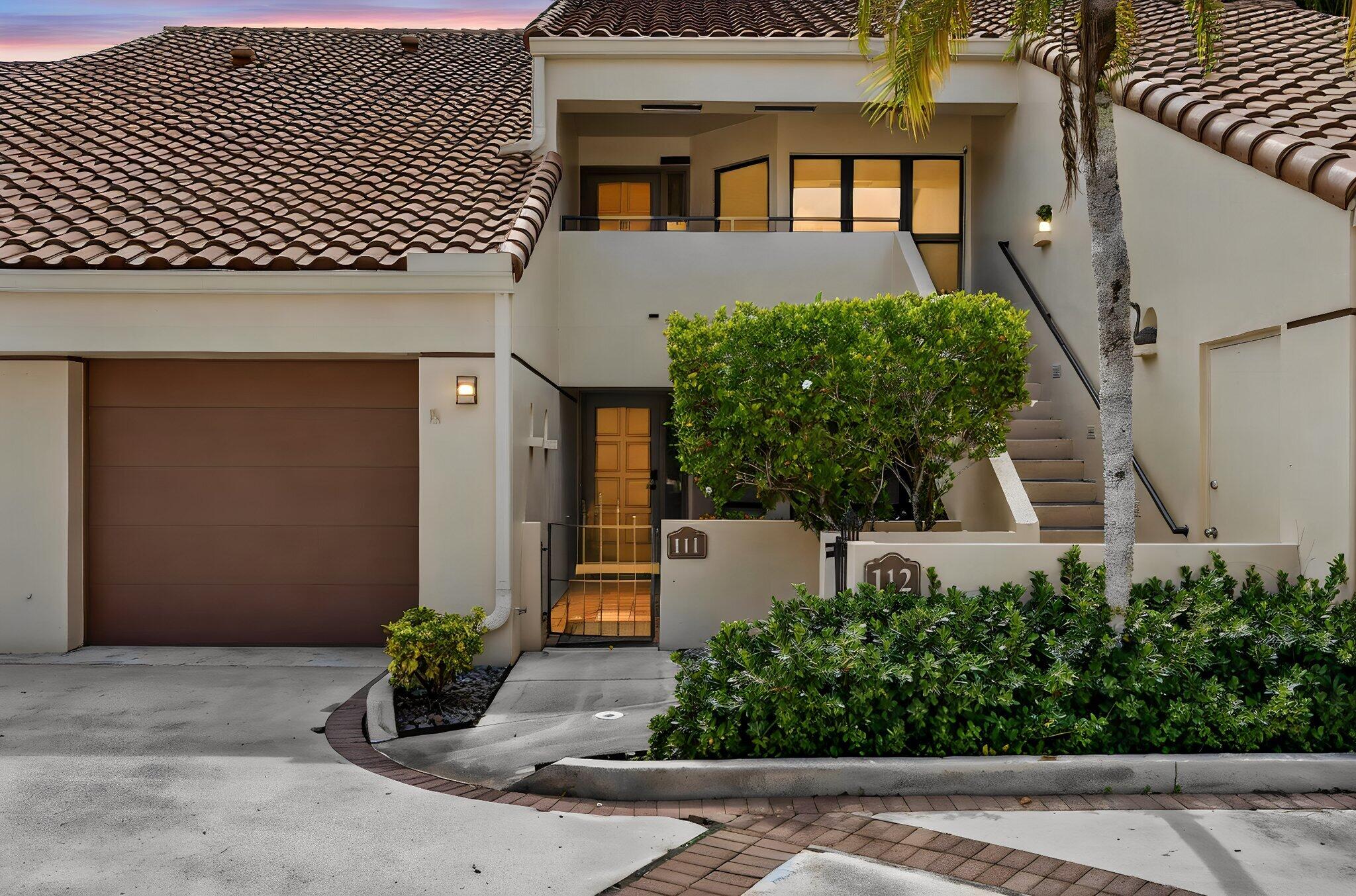 Welcome to effortless luxury living in the prestigious PGA National community of Palm Beach Gardens. This beautifully completely remodeled first-floor 2-bedroom, 2-bath condominium has been thoughtfully redesigned with high-end finishes and exceptional craftsmanship throughout, offering the perfect blend of elegance, comfort, and convenience.  No detail has been overlooked. The stunning new kitchen features polished porcelain tile flooring, solid granite countertops, custom finishes, and sleek black stainless LG appliances. The spa-inspired primary suite boasts custom cabinetry, Boreal Honed Ivory porcelain tile, a frameless glass shower, new soaking tub, and designer fixtures. Throughout the home you'll find luxury flooring with custom baseboards, smooth ceilings fresh designer paint,