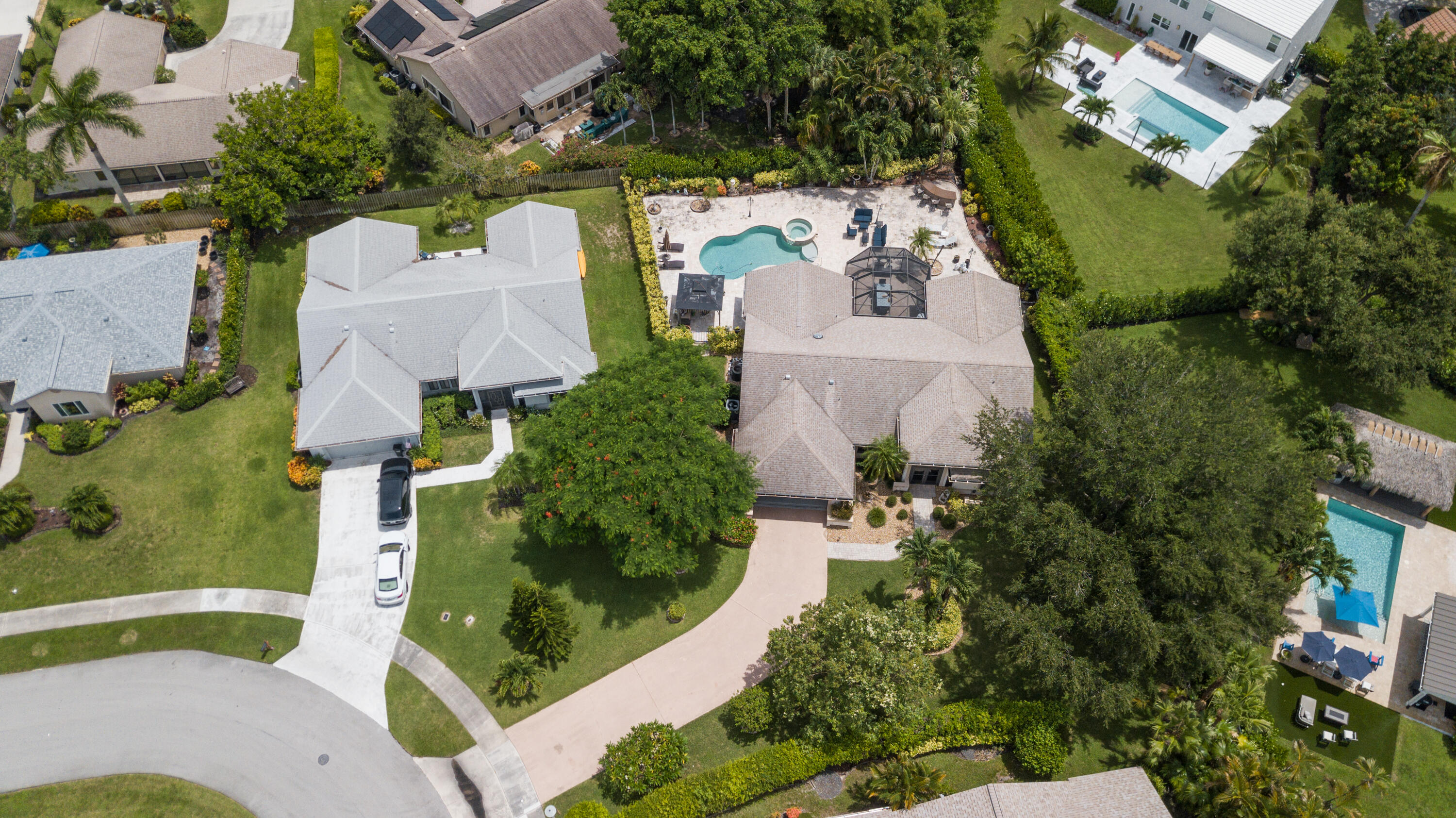 Welcome to The Estate section of Rainberry Bay. This home is situated on a private lot at the end of the cul-de-sac.  Open floor plan with 2 bedrooms 2.5 baths, double door entry with vaulted ceiling to formal living room. Private pool/spa, 2 screened patios with plenty of outdoor space for entertaining.  Enjoy an active adult community with 10 Har Tru courts, Bocce Club, 8 Pickleball Courts, cards, theater,crafts and yoga. 5 heated pools, lap and water aerobics. Resort style living at its best! Guard Gated entrance, 3 miles to the beach. Farmers markets, Atlantic Ave and Pineapple Grove.                                                                                                                                                                                                        HOA covers roofs, exterior painting and lawn maintenance.