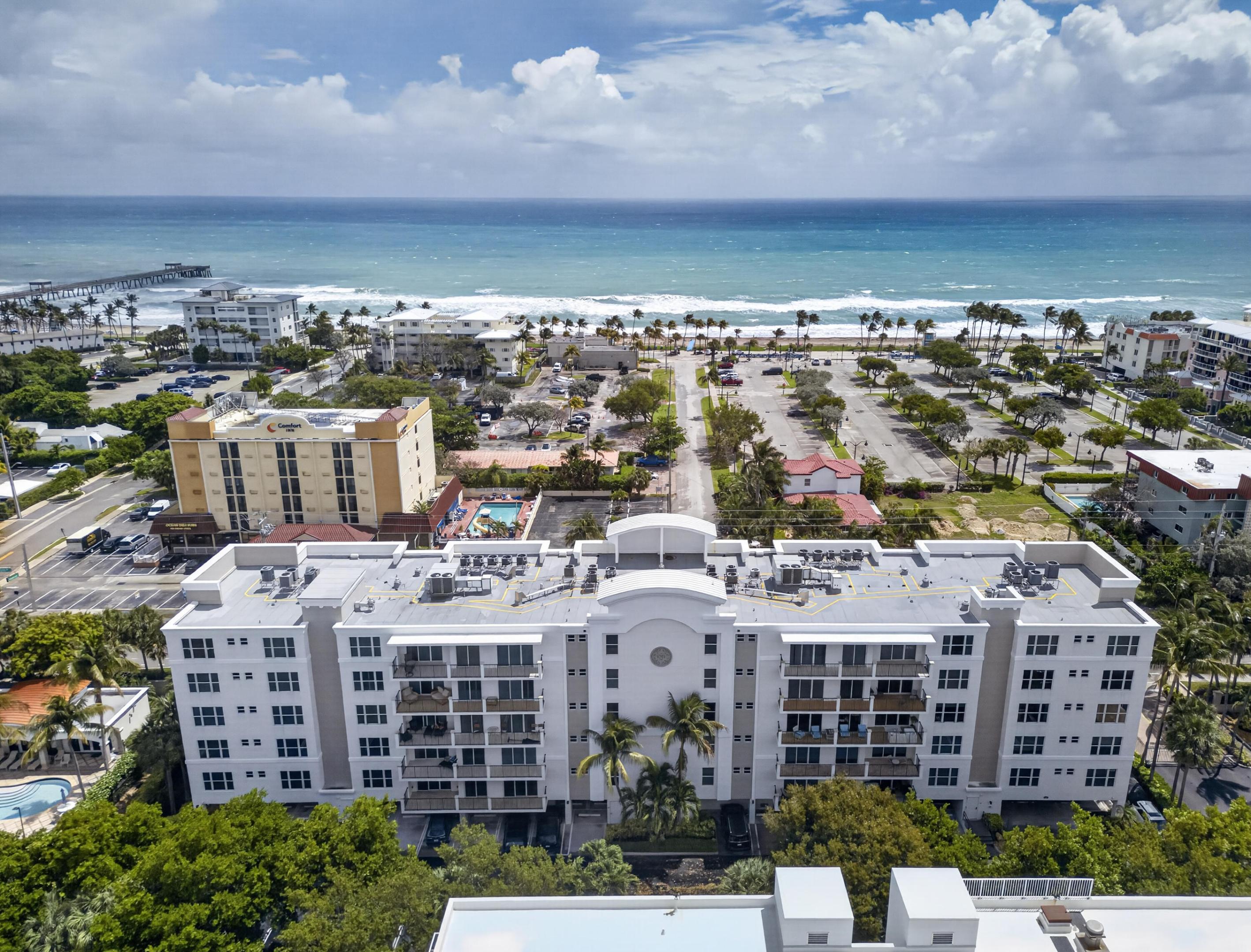 Enjoy coastal living at 1 Ocean Boulevard, just one block from the award-winning Deerfield Beach and fishing pier. This resort-style gated building offers exceptional amenities including a pool, fitness center, BBQ area, and on-site management. The unit features high ceilings, floor-to-ceiling impact doors, and an oversized balcony perfect for enjoying ocean breezes. The spacious primary suite boasts floor-to-ceiling doors and two large California walk-in closets. Includes 1 deeded parking space plus ample guest parking. Pet friendly.