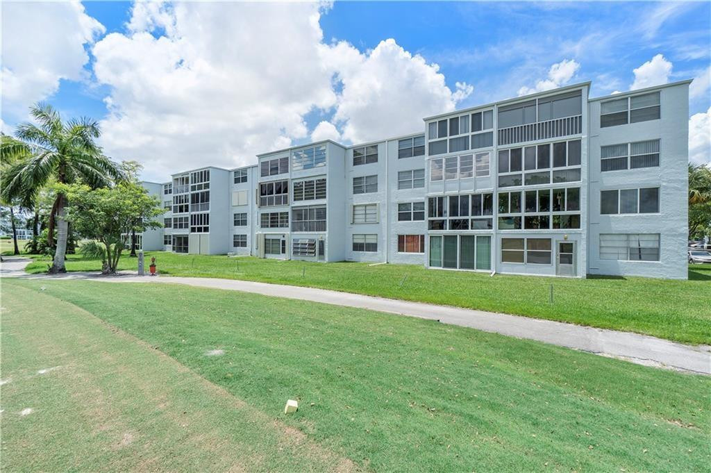 WOW!!! RARELY AVAILABLE REMODLED GROUND FLOOR CORNER UNIT DIRECTLY ON THE GOLF COURSE. THERE ARE NO GOLF COURSE MEMBERSHIP FEES. THIS LARGE UNIT FEATURES AN AMAZING GOLF TEE VIEW FROM YOUR ENCLOSED FLORIDA ROOM FOR ADDED LIVING SPACE. TILE THROUGHOUT  LIVING AREAS, WOOD FLOORS IN  BEDROOMS. ADDITIONAL STORAGE SPACE LOCATED OUTSIDE. THIS UNIT HAS BEEN FRESHLY PAINTED AND THOROUGHLY CLEANED. THIS UNIT IS WAITING FOR YOU TO BE ITS NEW OWNER AND MAKE IT YOURS!