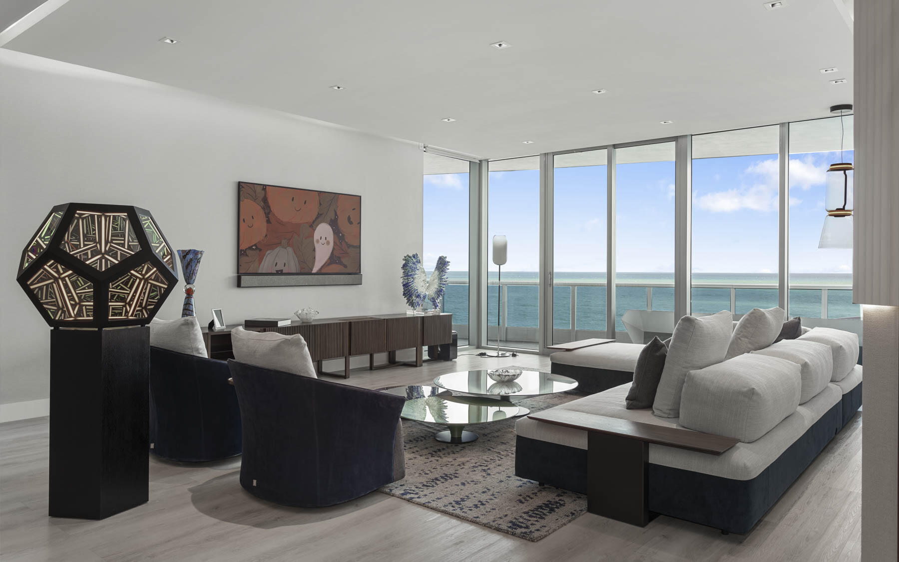 Welcome to Unit 1003 at the prestigious Bath Club Residences, located in Miami Beach. This meticulously fully renovated 4-bedroom, 4.5-bath condominium was completed in late 2023 and showcases a blend of sophistication and cutting-edge design, offering a turn-key lifestyle in one of Miami's most iconic buildings. This property is offered fully furnished with high-end designer pieces, making it ready for immediate enjoyment.

Step inside and be greeted by an expansive, open-concept layout, highlighted by floor-to-ceiling windows that allow for stunning views of the Atlantic Ocean. The residence features a state-of-the-art smart home system including Lutron HomeWorks lighting, Hunter Douglas motorized shades, and integrated Samsung SmartThings TV and audio control, all designed for seamless, modern living.

The chef's kitchen boasts top-of-the-line appliances including a Thermador cooktop and Bosch dishwasher, paired with The Galley's sleek sink accessories. Thoughtfully appointed with elegant dinnerware, All-Clad cookware, and top-grade small appliances like a Vitamix and Smeg juicer, this kitchen is perfect for culinary enthusiasts.

The primary suite is a sanctuary of luxury, featuring a Sleep Number bed, custom furniture, and an indulgent ensuite bathroom with a clothes steamer, Joy table, and bamboo stool. Additional highlights include a private office with a queen-sized Murphy bed and bespoke shelving, ideal for remote work or guest accommodations.

Enjoy Miami's perfect weather from the expansive private terrace, complete with Vondomm-designed outdoor furniture, two-person chaise lounge, and dining spaceperfect for both entertaining and relaxation. Residents also benefit from two deeded parking spaces (valued at $190,000), making this an exceptional offering in Miami Beach.

The Bath Club provides an exclusive living experience with resort-style amenities, including direct beach access, a pool, spa, tennis courts, and 24/7 concierge service. Enjoy the privacy of a gated community while still being just minutes away from world-class dining, shopping, and entertainment in South Beach, Bal Harbour, and beyond.

Experience coastal luxury at its finestschedule your private tour of Unit 1003 today.