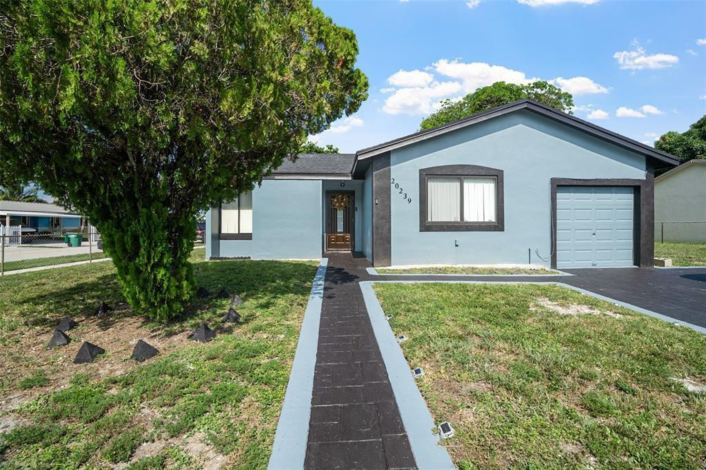 Beautiful and spacious home Located in a quiet, neighborhood this well-kept Miami Gardens home offers comfort, simplicity, and great value — perfect for first-time buyers' or large family with possible in-law quarters ** SELLER WILL HELP WITH CLOSING  COSTS ** Home offers a functional layout with  bright living area,  practical kitchen with plenty of cabinet space, and comfortable bedrooms. Enjoy the privacy of a fully fenced yard on large corner lot ideal for outdoor relaxation or gardening, A spacious driveway provides convenient off-street parking room to expand if desired.  Conveniently located to Broward County major highways schools shopping centers. Seller upgraded everything new roof concrete driveway new electrical panel Home is in spotless condition Ready for new owner to enjoy