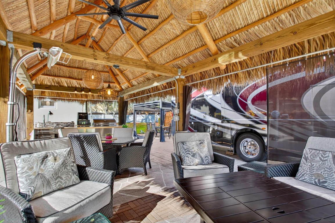 Bring your CLASS A motor coach and embrace the ultimate South Florida lifestyle! Aztec RV Resort, an exclusive ALL-AGE, MAN-GATED RV COMMUNITY, is situated near Fort Lauderdale Airport, pristine beaches, world-class dining, shopping, and entertainment. This stunning parcel offers the perfect blend of comfort and luxury. Enjoy a beautiful TIKI completed in 2022 with KITCHEN, DINING AREA, and a FAMILY ROOM—perfect for entertaining or unwinding. For added convenience, the property features a CASITA, designed with a kitchenette, bathroom and a MURPHY BED. When it comes to recreation, the activities are endless! Engage in PICKLEBALL TOURNAMENTS, socialize at HAPPY HOURS, or enjoy the TENNIS/PICKLEBALL COURTS. Don’t miss your chance to enjoy this incredible lifestyle where luxury meets adventure