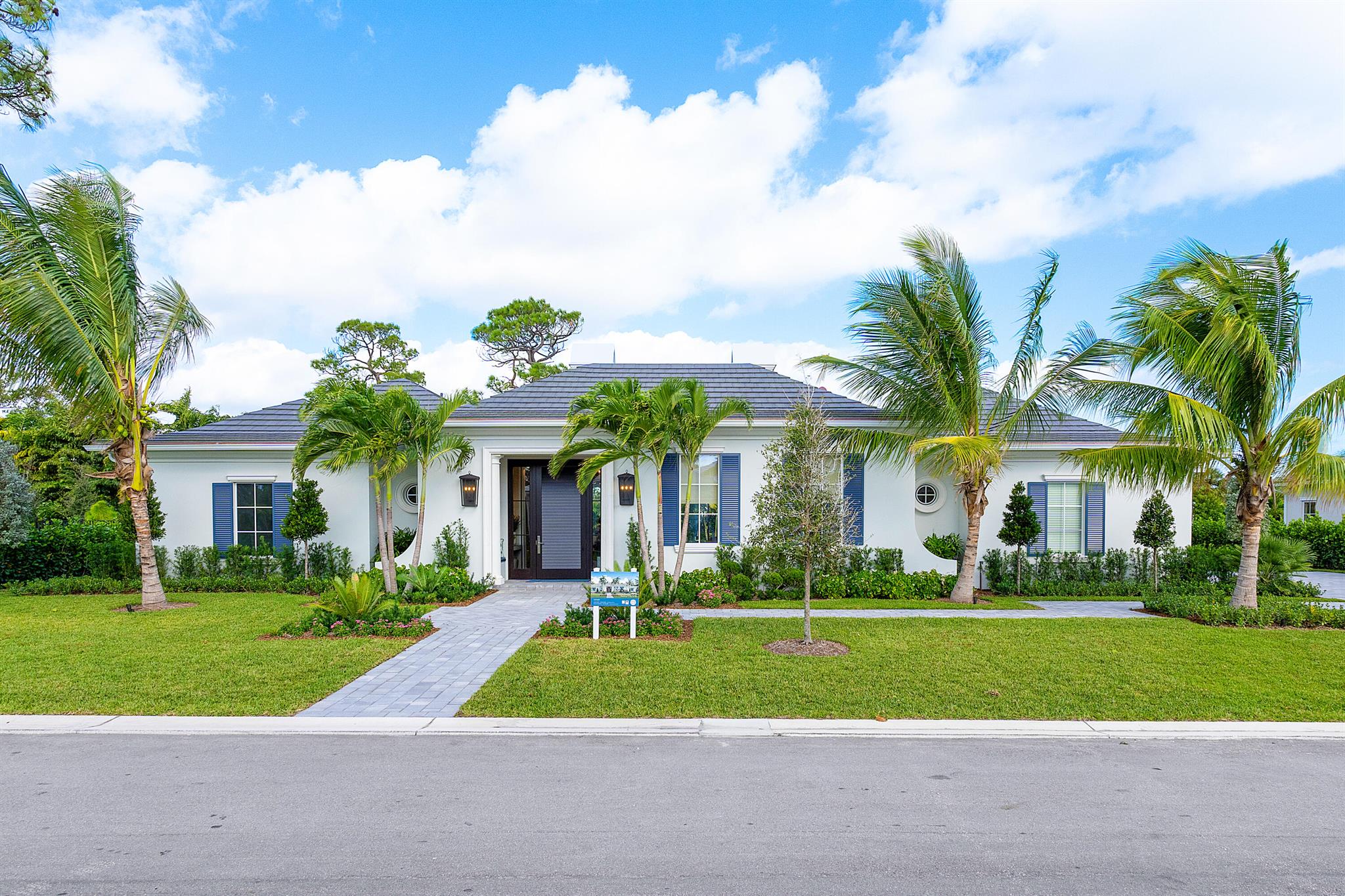 The Nautilus home is complete and available for sale now!  Masterfully crafted at the peak of design and technology, our stunning home evokes a lifestyle of ease and wellbeing.  Influenced by the breezy architecture of Bermuda, this home at Bluewater Cove provides a peaceful haven for relaxing, gathering, and savoring the sweet life.  With a beautiful custom pool and spa, your home is a real paradise for outdoor living.
Courchene Development and Ironwood Properties have collaborated to create the Bluewater Cove community with the expertise of the renowned Affinity Architects. Disclaimer:  Real estate agents affiliated with The Corcoran Group are independent contractor sales associates and are not employees of The Corcoran Group. Equal Housing Opportunity. The Corcoran Group is a licensed real estate broker located at 400 Royal Palm Way, Suite 110, Palm Beach, Florida 33480. All information furnished regarding property for sale or rent or regarding financing is from sources deemed reliable, but Corcoran makes no warranty or representation as to the accuracy thereof. All property information is presented subject to errors, omissions, price changes, changed property conditions, and withdrawal of the property from the market, without notice.