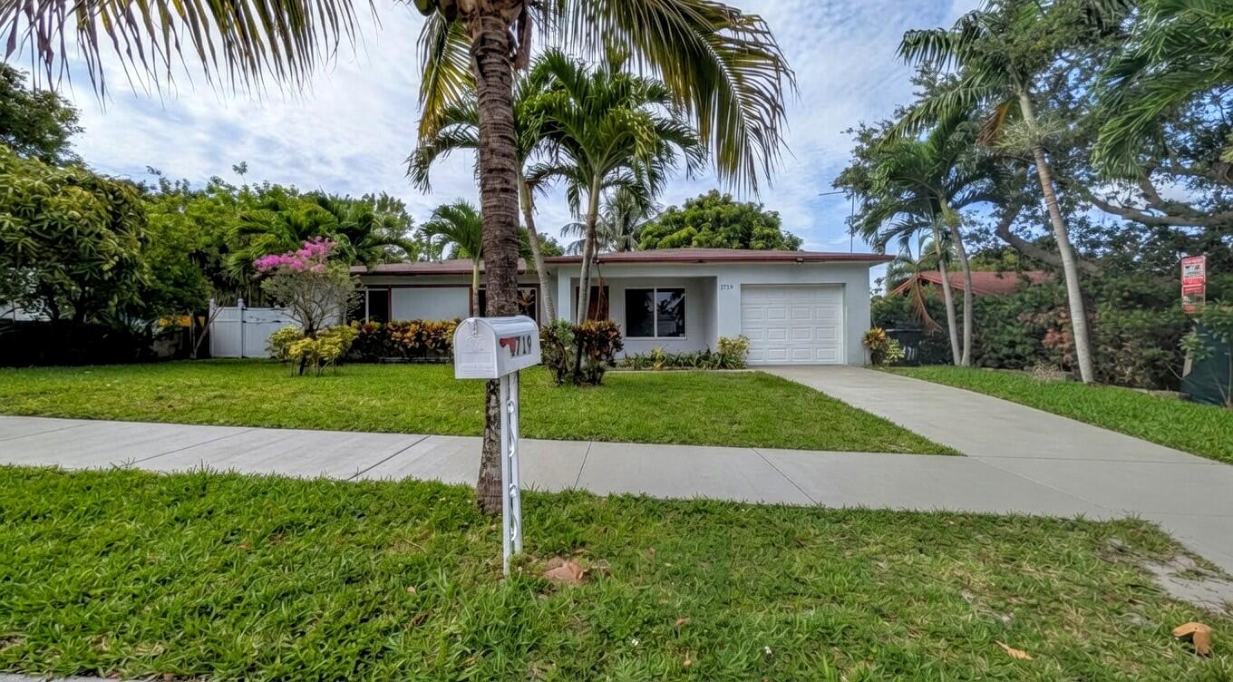 Charming 3-Bedroom, 2-Bath - 1-Car Garage Home. Updated kitchen with modern appliances (including dishwasher, disposal, microwave, range, and refrigerator). Tile flooring throughout, central A/C. The spacious backyard with vibrant fruit trees is perfect for entertaining or relaxing. Located in the desirable Lake Clarke South neighborhood, it offers quick access to highways, shopping, dining, beaches, and local attractions. Pets welcome. Ideal for comfortable Florida living!