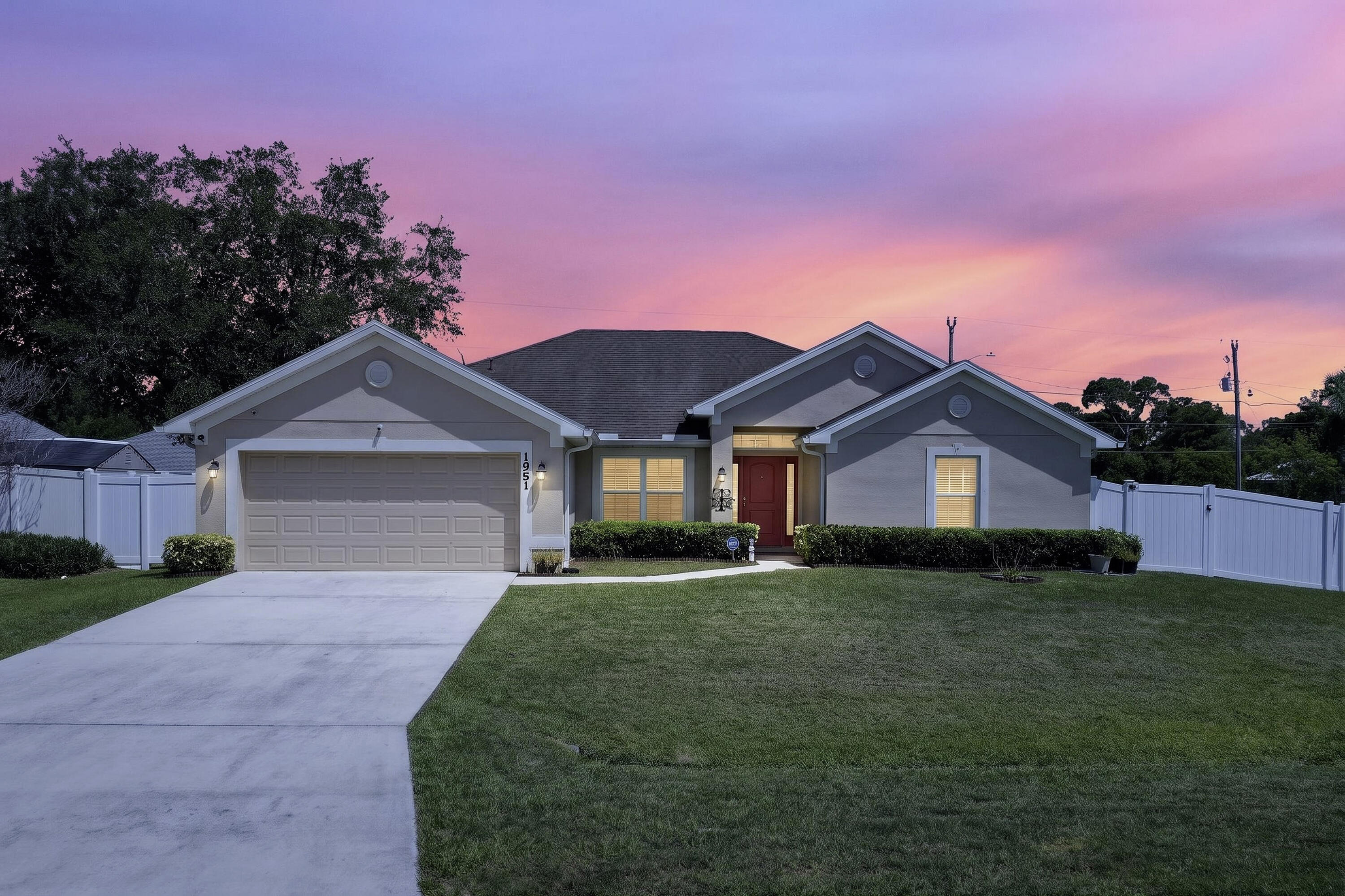 Seller is offering $5000 towards Buyer's Closing Costs. Come enjoy this 4/3/2 corner lot home with a fenced yard!  This well- maintained home has a huge Great Room, kitchen area eating as well as a Dining Room that could be used as a den.  Tasteful luxury vinyl flows from one room to the other.  The kitchen has white cabinets, SS appliances and a pantry.  The large primary BR suite adjoins the expansive bathroom with an exquisite walk-in shower.  The other three bedrooms are on the other side of the home with one of the bathrooms adjoining two of the bedrooms and the 4th BR having a bath right outside its door.  Loaded with storage room inside, the attic also has a pull-down.  The comfortable, screened lanai overlooks the fenced backyard. Great home in a great location.!