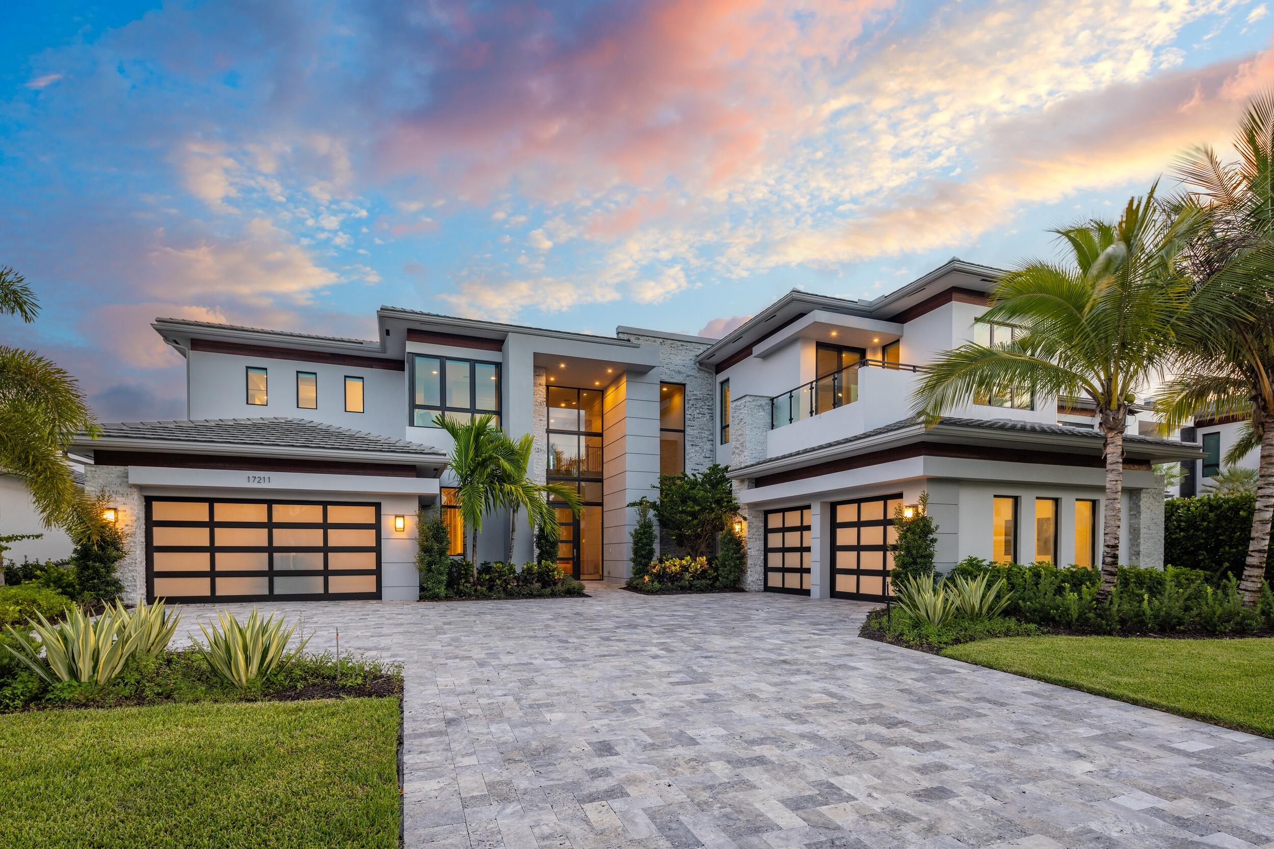 EXTRAORDINARY VALUE: PRICE ADJUSTED BY $170,000. Cast inside one of Boca Raton's most coveted communities, 17211 Brulee Breeze reaches the pinnacle of extravagant living with a captivating array of highlights. Boca Bridges, complete with lavish amenities and elite security, provides the prestigious backdrop for a luxury estate fashioned with meticulous attention to detail by GL Homes.

Nestled on a sprawling waterfront lot, the distinguished Vanderbilt Grande Contemporary model delivers inviting resort-style allure to the luxury residential experience. The property itself offers a total SF of 11,372 FT including 8,179 SF of living space. The spacious and exquisitely designed layout features six generously proportioned bedrooms with ensuite bathrooms, plus a powder room and a cabana bathroom, a warm and inviting family room, a loft with a private balcony and a four-car garage.

The Vanderbilt Grande Contemporary model is built with the highest quality finishes and light-filled spaces that bring the outdoors inside. The state-of-the-art gourmet kitchen, showcasing premium appliances such as Wolf and Miele, and a water filtration system.

Outside, you'll find a host of luxurious features, including a covered loggia with a summer kitchen and a saltwater pool that overlooks the serene waters at Boca Bridges. It's an ambiance of tranquility and sophistication that, like the estate itself, offers the best of all worlds.

At the center of the community resides a spacious 27,000 SF clubhouse where residents can gather, socialize and dine at the 5-star restaurant "Cut 5." For those with an active lifestyle, the community offers a fitness studio equipped with cardio and strength training machines, invigorating yoga sessions, an indoor basketball court, six clay tennis courts (and one asphalt), plus four courts dedicated to the trending sport of pickleball. At the main pool area, adults can relax by the outdoor bar area; meanwhile, children and families can revel in the adjoining splash water park.