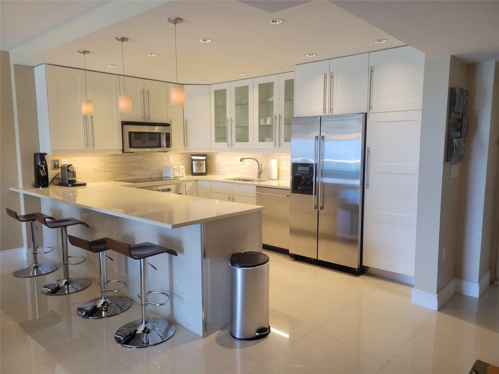 ***IMMACULATE AND ELEGANT 12TH FLOOR UNIT FACING WEST WITH GORGEOUS OCEAN,INTRACOASTAL AND SUNSET VIEWS! ELEGANTLY RENOVATED AND FURNISHED UNIT. OWNERS SPARED NO EXPENSE! THE LAYOUT HAS BEEN CAREFULLY RECONFIGURED TO ACCOMODATE EXTRA GUESTS /MURPHY BED, AND A SPARE ROOM WITH CLOSET. SOLD AS IS-FURNISHED, TURN -KEY. BOTH A/C BLOWERS HAVE BEEN RECENTLY REPLACED. WASHER & DRYER IN UNIT. NEW BEDROOM HURRICANE IMPACT WINDOWS COMING SOON. RENTALS ALLOWED FOR A MINIMUM OF 6 MONTHS OR SHORT TERM WITH PROPER LICENSES. COVERED GARAGE PARKING SPOT. ACROSS THE STREET TO BEACH, AND MINUTES AWAY TO HOUSES OF WORSHIP, SUPERMARKETS, BANKS, CAFFES, RESTAURANTS, FAMOUS SHOPPING, AVENTURA MALL, ETC. BUILDING HAS POOL, GYM, BBQ, TENNIS COURTS, BILLARD, HAIR SALON, CAFFE, MINI MART. A TRUE PRIME LOCATION!***