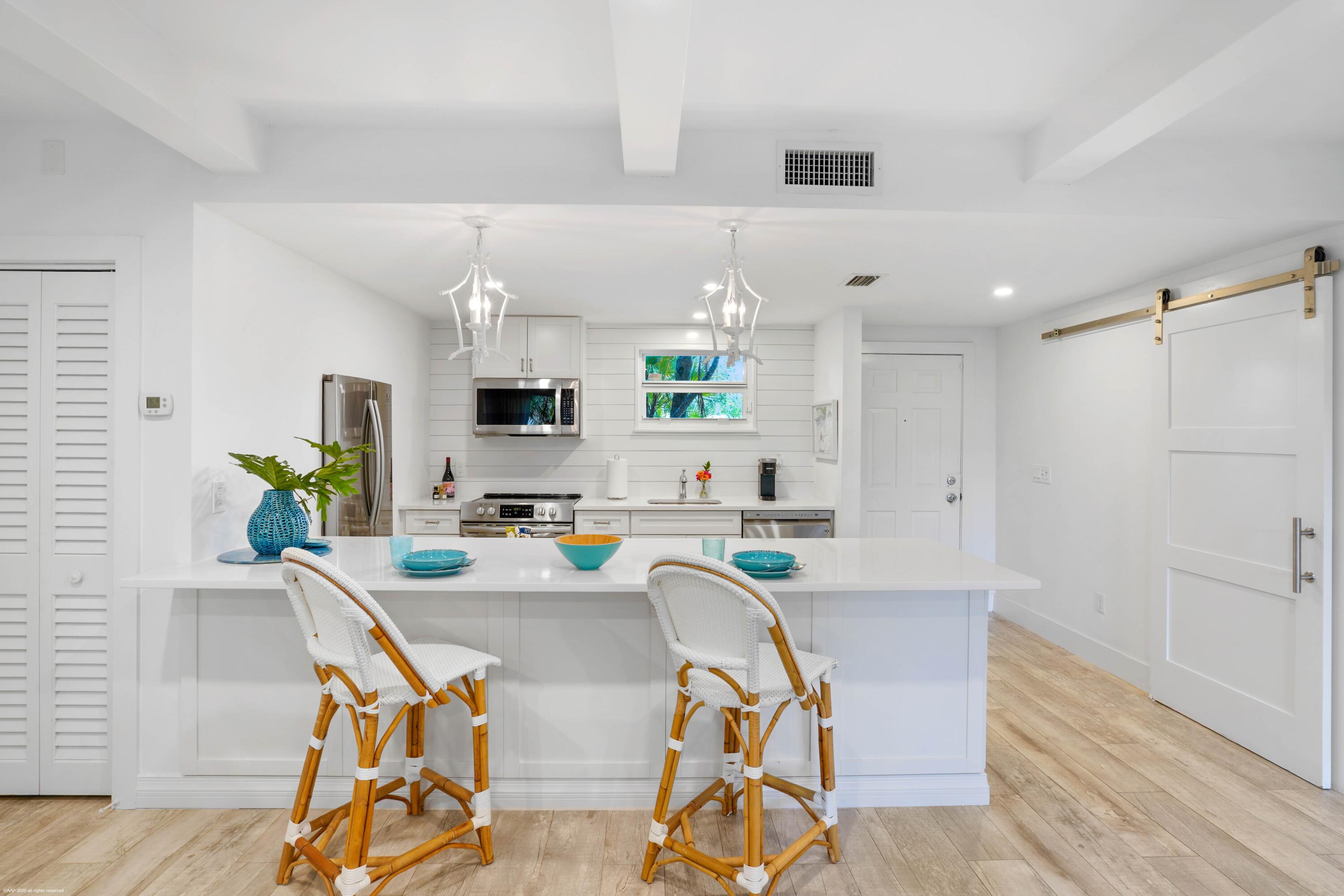Beautifully renovated and tastefully decorated 1BR/1BA Bagatelle condo in Palm Beach Polo, ideally located on the first floor. This charming residence features a backyard area perfect for pets and is conveniently located just steps from the community pool. Offering comfort, style, and convenience in one of Wellington's most sought-after gated communities, this rental is ideal for seasonal or off-season living. Close to equestrian venues, shopping, dining, and all that Palm Beach Polo has to offer. Offered at $1,975./month off-season and $5,950/month in-season.