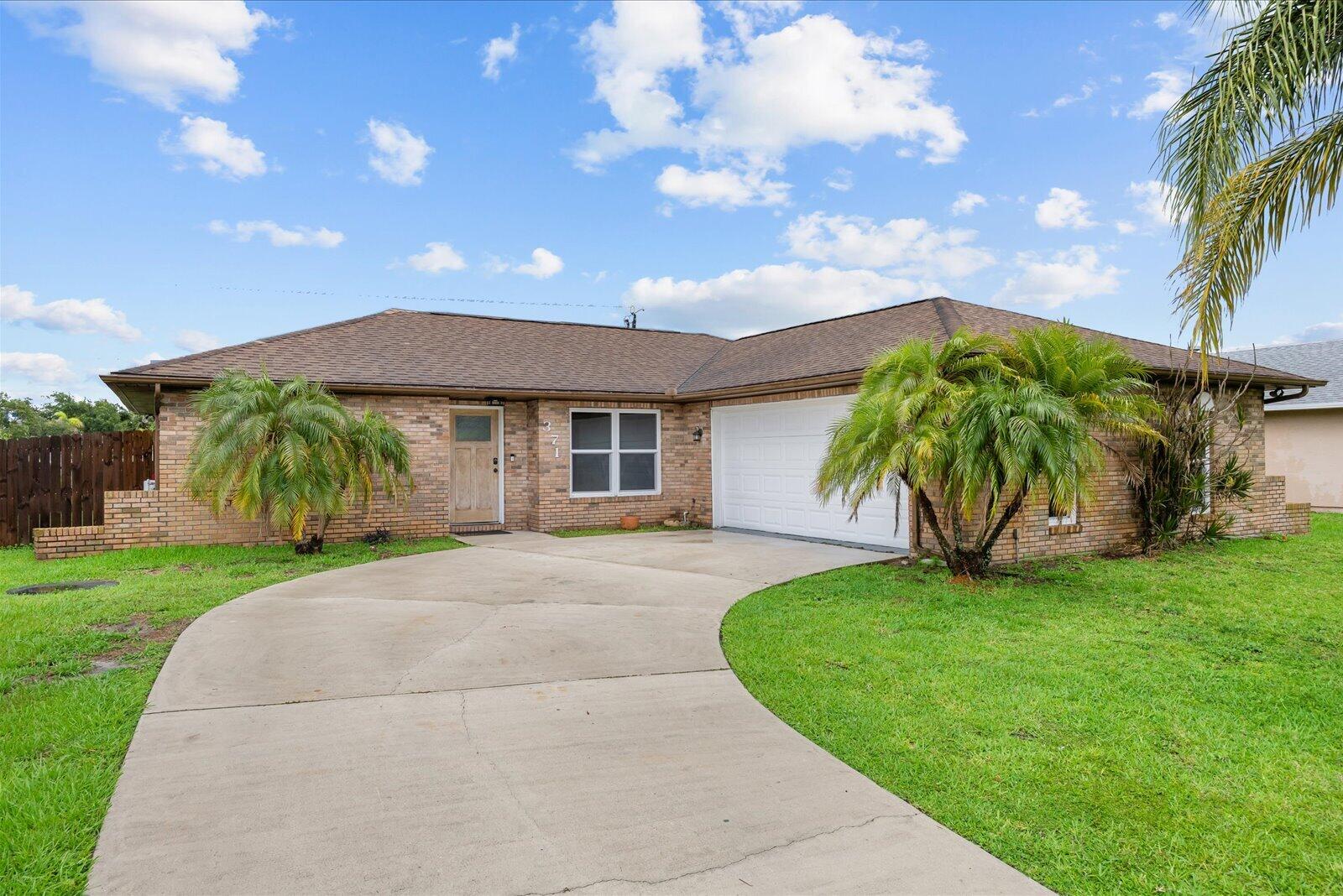 Welcome to this well-maintained Port St. Lucie home offering 1,676 square feet of comfortable living space. Featuring 2 spacious bedrooms, 2 full bathrooms, and a desirable open-concept layout, this home provides both functionality and everyday comfort. The two-car garage offers ample space for parking, storage, or hobbies. Conveniently located near shopping, dining, medical facilities, and major roadways, this property combines accessibility with the charm of a quiet residential neighborhood. Whether you're looking for a primary residence, seasonal retreat, or investment opportunity, this home offers exceptional value and endless potential.