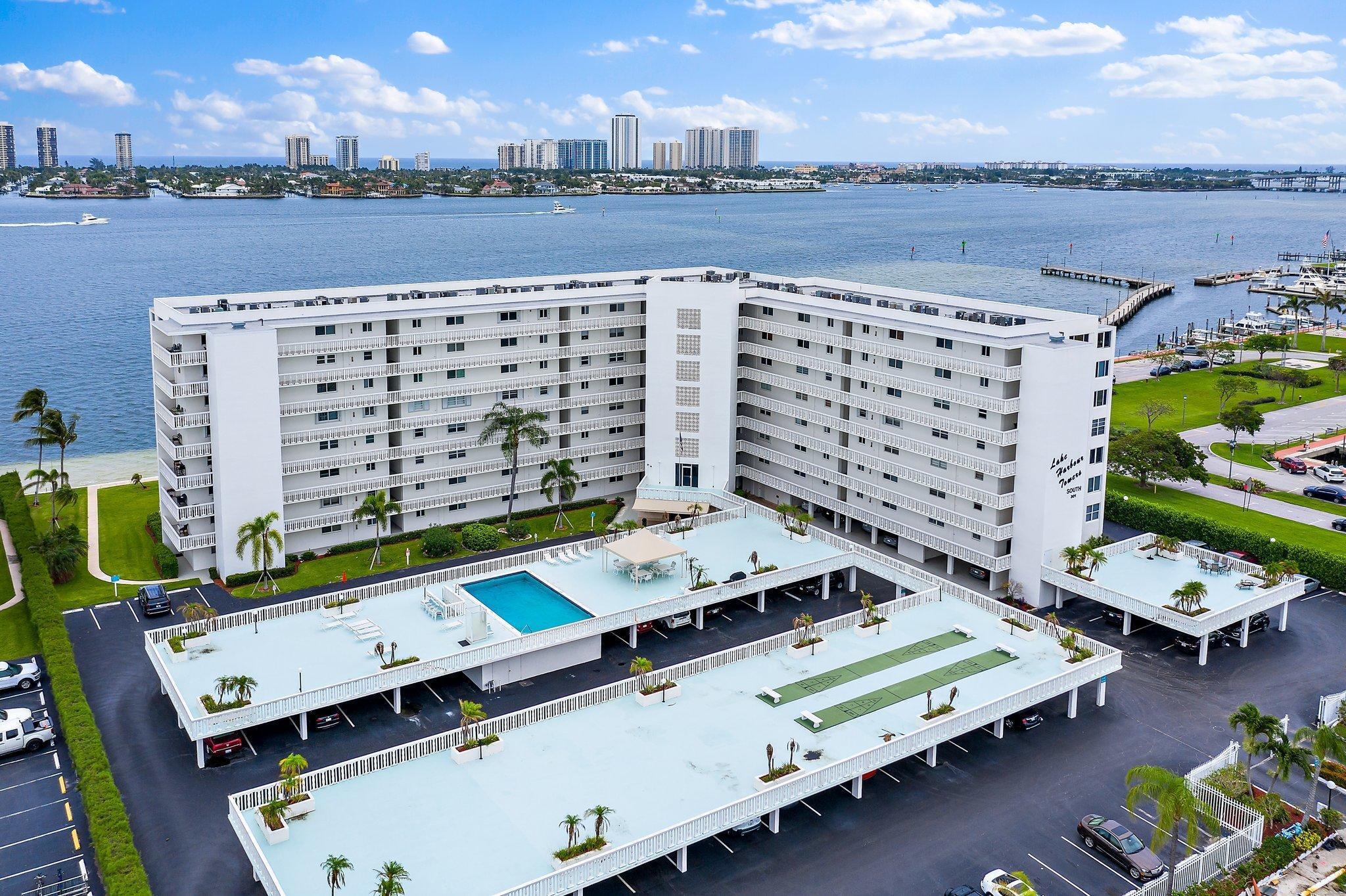 Avail for short term or annual. Welcome to this furnished 2-bedrm, 2-bathrm condo located in Lake Harbour Towers in Lake Park. This waterfront property offers 1,363 square feet of finished living space  providing a convenient location in a  well-established community. The thoughtfully designed layout accommodates modern living needs with separate bedrms and bathrms for privacy and comfort. Situated on the water's edge, this residence captures the essence of waterfront living while remaining centrally positioned within the Lake Harbour Towers community. This condo presents an excellent opportunity for those seeking a waterfront lifestyle in Lake Park. Impact Windows. Comm heated pool. Located next to Lake Park Marina. 12.5% tax on terms less than 6 mo 1 day. Details available upon request.