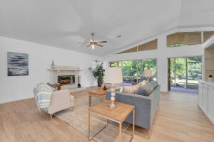 The Largest Original Model Home in Marsh Landing! Walk in the foyer to reveal the huge open airy Living Room overlooking Patio and Backyard forest while the large mantled fireplace centers the spacious room. A full cabana bath has access to patio/lanai and massive family eat in kitchen with its all-over-built-ins - pantry, writing desk, China cabinets - and stainless steel appliances complimenting granite counter breakfast bar. Pass the formal dining area with room for twelve-and-more as you enter the privacy of three impressive bedrooms and two more full baths plus a separate whirlpool tub for weary bones!. Oversized garage houses storage cabinets galore. Room for pool or utilize all clubhouse amenities including a hot tub and heated lap pool. Best Deal For Your Money!