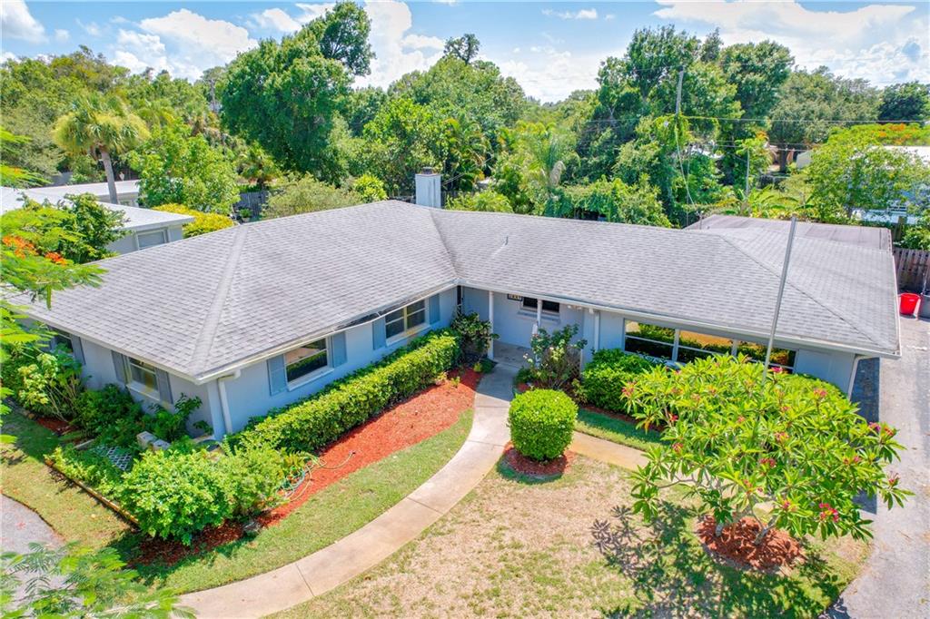 A RARE FIND!!! BEAUTIFUL CENTRAL VERO POOL HOME (NO HOA), LIGHT AIRY, SPACIOUS ROOMS, HUGE SPARKLING, TROPICAL POOL WTH VINE-COVERED PERGOLA, DBL SIDED STONE FIREPLACE, LARGE KITCHEN (17X17) , SHINING HARDWOOD FLOORS, CEDAR-LINED CLOSETS, WALK-IN SHOWER, BAHAMA SHUTTERS, CROWN MOLDING, BUILT LIKE A FORTRESS BY PARENT CONST.