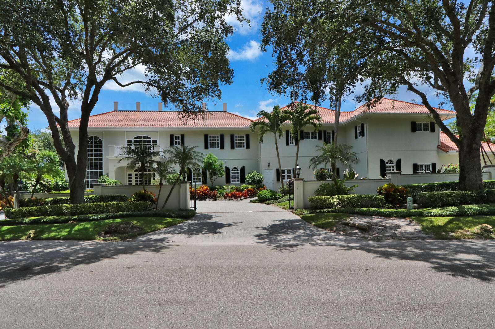 Mirador is an exquisite 8,166 square foot, 3-story Mediterranean estate, featuring 6 bedrooms and 8.5 bathrooms located on a privately gated waterfront lot with 206 feet of frontage on a secluded lagoon with boat access.  Sweeping views of the St. Lucie River and/or Atlantic Ocean can be seen from every room of the home as well as from the covered lanais and balconies.  A relaxing saltwater pool and Jacuzzi are features of the terraced, lushly landscaped backyard.
This masterpiece features a brand new Downsview chef's kitchen with Miele appliances and a LaCornue range as well as hardwood and stone flooring, custom lighting, window covering and architectural mouldings and built-ins are prominent throughout the HD camera secured home.
This one of a kind estate is conveniently located near