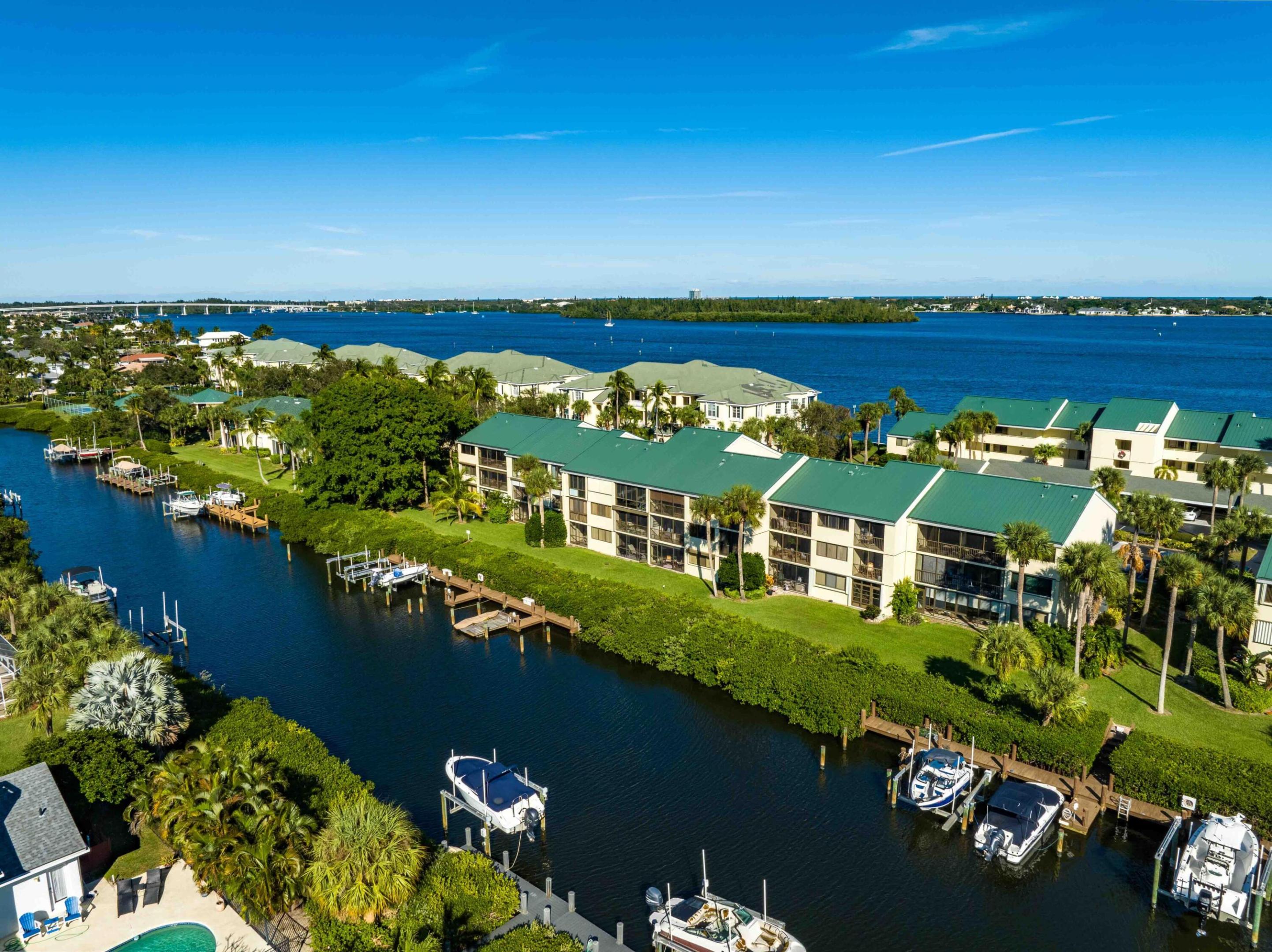 Beautifully updated 2-bedroom, 2-bath first-floor canal-front condo just 5 minutes from the beach, less than a mile from Publix, restaurants, and shopping. Conveniently located just minutes from Vero Beach Regional Airport, making travel easy for seasonal residents .  This bright, open-concept, step-free home features a renovated kitchen with granite countertops, a spacious primary suite with a walk-in closet, two screened-in porches, and is pet-friendly, with easy first-floor access for you and your furry companions. Enjoy resort-style amenities including a pool, clubhouse, outdoor grills, a self-serve car wash, and newly refinished pickleball/tennis courts.  Ideal as a full-time home, seasonal retreat, or investment property. move-in-ready condo provides the perfect blend of comfort, convenience, and the Florida lifestyle.