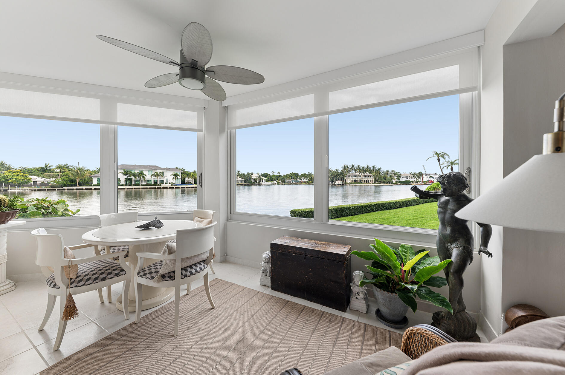 Rare opportunity to own 1 of only 3 units in The Barrton with a full-size washer and dryer in the unit! This beautifully renovated 2BR/2BA first-floor condo offers panoramic Intracoastal Waterway views from the spacious living area, a remodeled kitchen with custom cabinetry and granite countertops, and ample storage throughout unit. The crown molding and renovated primary bath with dual sinks and an oversized shower is a luxurious touch. Impact windows. Covered parking included. Just 0.64 miles to Atlantic Avenue and 1.2 miles to the beach. Gated community with 24/7 security. No rentals or pets. Financing requires 20% down. Square footage was calculated from a plan provided in the Declaration of Condominium. Measurements are approximate and should be independently verified.