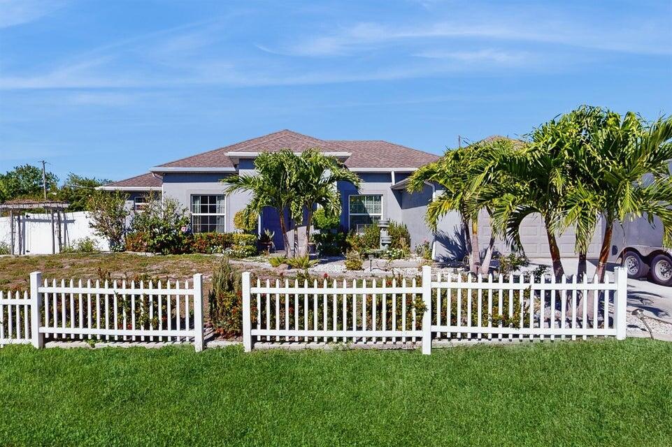 Charming 4-Bedroom Home with Spacious Yard and Modern Amenities Welcome to this beautiful 4-bedroom, 3-bathroom home, and a huge office offering an open-concept design.. Built in 2019, this meticulously maintained property boasts 2,218 square feet of living space. The heart of the home features a stunning kitchen with a spacious island, complemented by sleek stainless steel appliances, making it the perfect place to prepare meals. The expansive master suite includes a luxurious en-suite bathroom with both a shower and a jacuzzi tub. Enjoy the outdoors in your expansive yard, where you'll find a variety of fruit trees. The screened-in patio is an ideal spot for enjoying the fresh air without the worry of insects. This home also includes a 2-car garage, providing ample storage .