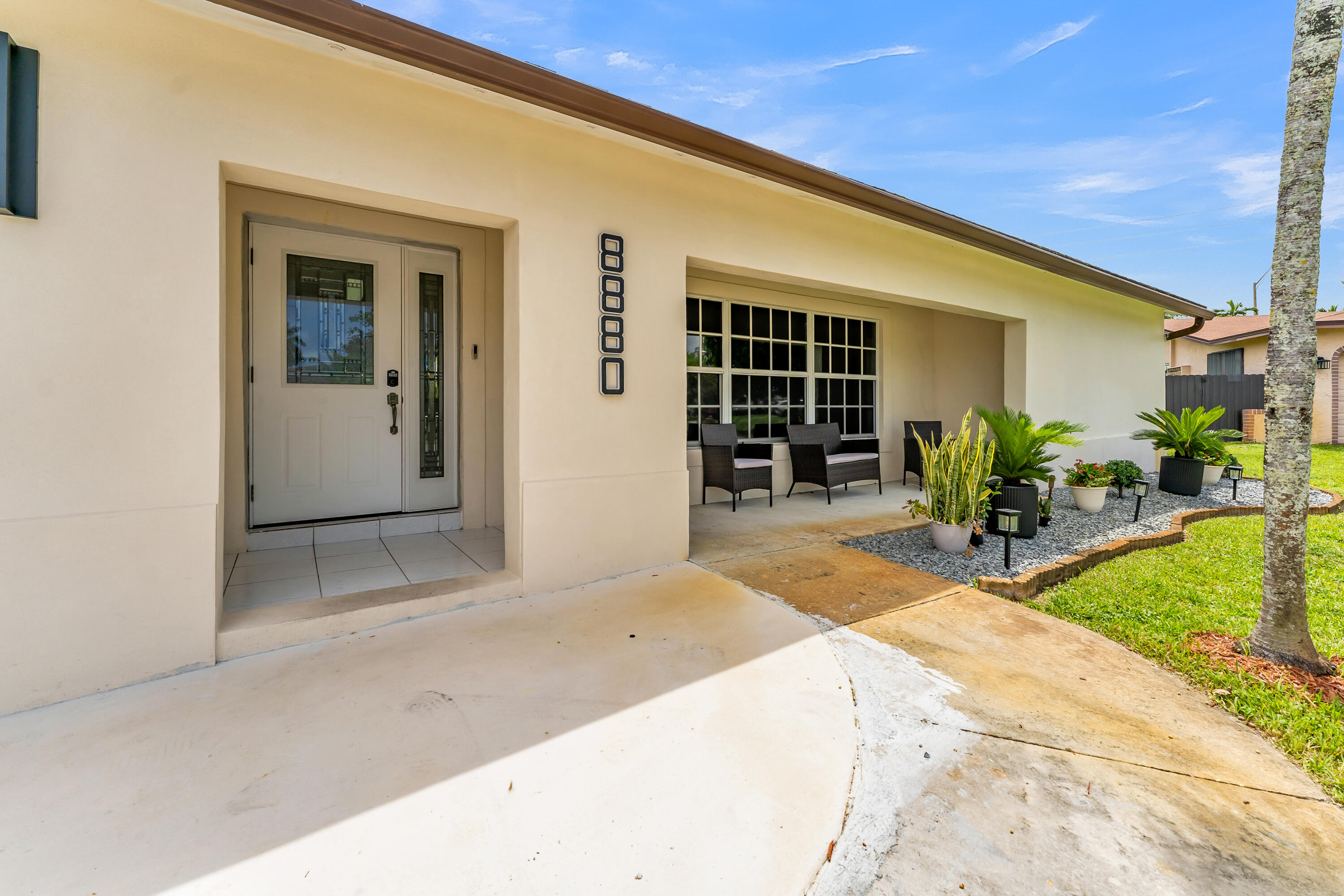 5 bedroom - 3 bath home with a 2 car garage sits on nearly one third of an acre (14,043 sq ft). Step inside to a spacious floor plan with generously sized rooms, perfect for everyday living and entertaining. This over sized fully fenced backyard is the true highlight, featuring a sparkling pool, covered patio, plenty of room for outdoor activities or future additions, and a dedicated concrete pad for your boat or RV.... the possibilities are endless on this piece of land. Recent updates include a 2022 A/C, 2022 water heater, impact garage door, and a resurfaced pool (2025). No HOA means you have the freedom to truly make this property your own. Enjoy the perfect combination of indoor comfort and exceptional outdoor living in your very own private South Florida oasis.