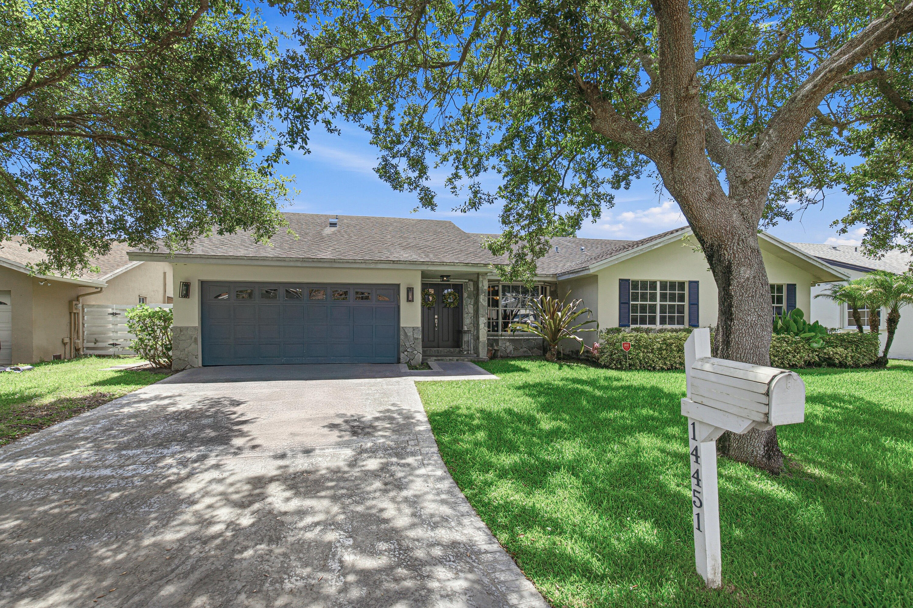 Upgraded single-family home in the coveted, Arvida-developed master community of Country Walk! Step inside a light-filled layout with high-hat lighting, custom fixtures, and blinds. The stunning chef's kitchen features stainless appliances, a mosaic backsplash, chocolate wood cabinets, and quartz countertops. Retreat to a turnkey master suite with dual sinks, a luxurious freestanding Roman tub, and a glass rain shower. Outside, enjoy a private oasis with a massive in-ground pool and covered patio. Spanning 1,200 acres, Country Walk offers a lakeside clubhouse, resort pool, Jacuzzi, splash pad, tennis/pickleball, basketball, playground, fitness trail, and fishing dock. Complete with 24/7 roving security and top annual events. A perfect blend of luxury and community!