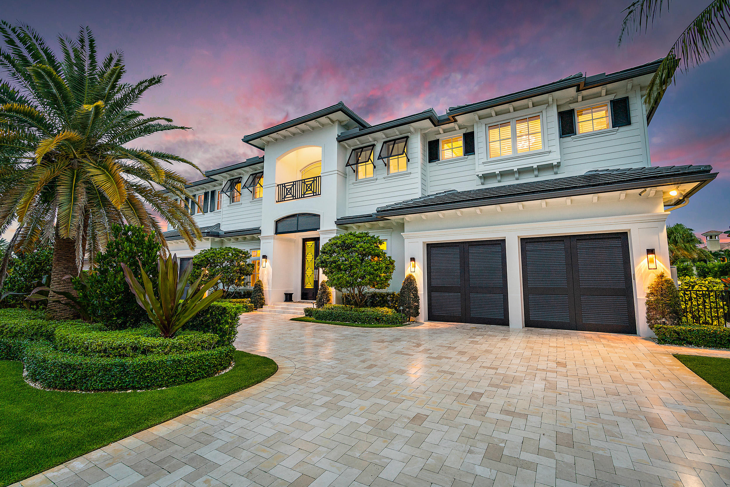 Imagined by JP Architecture & Design.Illuminated by By Design Builders.Expressed by P&H Interiors, this clean, transitional home delivers uncompromising sophistication and harmonious living. Five bedrooms, Five and a half baths, four car garage and over 7,100 living square feet. Beautifully lit with Fine Art Lamps, Corbett, Hubberton Forge and Elk Lighting and all controlled by the home's Vantage lighting system. The Crestron smart home system includes programable lighting, window shades, security cameras, climate control, music and alarm system. The living room is a perfect entertaining space, bathed in light through the wall of windows accompanied by a book matched porcelain fireplace. Downstairs media room and bonus/playroom. Luxurious custom Omega cabinetry compliments the home's kitchen and bathrooms, which were designed by P&H Interiors and Distinctive Kitchens. Kitchen counters are quartzite and all others countertops throughout are marble, granite, quartzite and quartz in including the laundry room. Marble and wood flooring compliment the home's clean and open design. An elevator with wood paneling and mirrors makes access easy for everyone or choose the elegant staircase up to second floor. Appliances are exclusively by Wolf throughout; and plumbing fixtures are the finest Rohl, Koehler, and Brizo have to offer. PGT windows sliders offer a clear view and access to the home's exterior, which is landscaped, and lit for decoration and security by Hinkley Lighting. Gorgeous modern design pool with spa and waterfall feature and LED multicolor pool lights. The dock is built on concrete pilings with Azek polymer decking and a Neptune 4-post 24,000 lb. boat-lift to effortlessly ease your boat in and out of the water. It's close proximity to the Hillsboro Inlet, unrestricted saltwater access and beautiful dockage make it a fisherman & boater's delight. Situated in a highly coveted, quiet, safe and village-like family neighborhood with all that waterfront living has to offer and just a short drive to shopping, tennis, restaurants, movies and nightlife, this home is ready for you individuality and expression!

The information herein is deemed reliable and subject to errors, omissions or changes without notice. The information has been derived from architectural plans or county records. Buyer should verify all measurements.