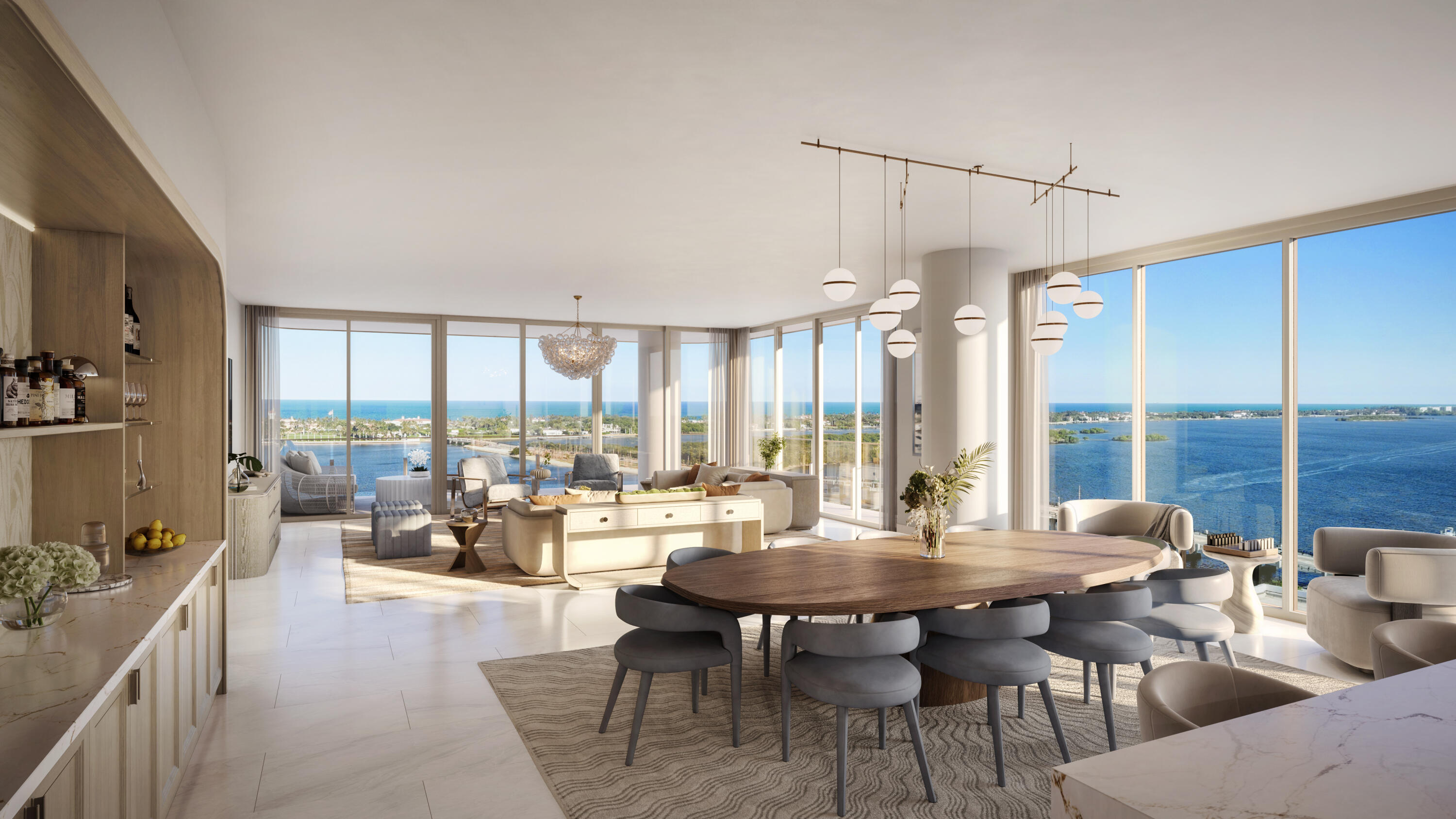 Residence C at Maison d'Or delivers an elevated estate-style waterfront living experience with expansive proportions, dramatic views, and a refined sense of privacy. Positioned within this exclusive collection of luxury residences, the home offers sweeping vistas across the Intracoastal Waterway, Palm Beach Island, and the Atlantic horizon beyond. Designed for sophisticated entertaining and comfortable daily living, the residence features floor-to-ceiling glass, generous terraces on both sides of the building, and expansive open-concept gathering spaces filled with natural light. The chef-inspired kitchen is appointed with premium Sub-Zero and Wolf appliances, custom cabinetry, quartz countertops, and designer-selected finishes. The primary suite provides a spa-inspired retreat complete  with oversized walk-in closets and luxurious marble and porcelain bath detailing. Maison d'Or is an ultra-luxury boutique waterfront condominium with only 39 owners offering a highly curated residential experience with anticipatory services and resort-inspired amenities. Residents enjoy access to a waterfront pool deck, wellness and fitness center, private lounges, dining and entertainment spaces, guest suites, wine storage, and concierge services, all within a private residential waterfront setting moments from Palm Beach Island, Worth Avenue, Downtown West Palm Beach, and premier waterfront attractions.