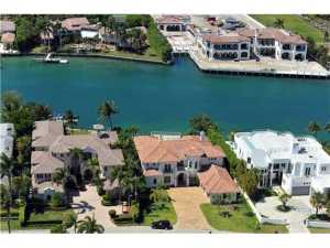 Newer State of the Art Direct Intracoastal Dream Mansion at the Beach area! Wow! Walk to the beach and downtown Boca Raton's Finest areas. Master Suite on first floor. Awesome Guest House, Fireplace, 6 BR/5.1BA, 3CG. See addenda for more info Gourmet state-of-the-art Kitchen, Huge Yard on the Intracoastal, No-Wake Zone, Boater's Paradise minutes from the Boca Inlet. Wow!!