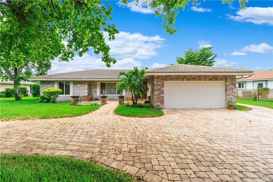 Amazing home in sought after Maplewood, Coral Springs! Impecably maintained - same owner for over 30 years. 3 oversized bedrooms with built in closets- office built- ins. Sunken living room, Fieldstone wall - living area floors travertine marble. Huge kitchen - Granite counters, stainless appliances, island & eat in kitchen are overlooking backyard beauty. Some hurricane impact windows, accordion shutters ...No popcorn ceilings. Open & broght floor plan. Large patio & great entertainng outside space.