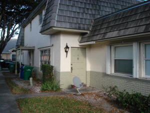 Two Bedroom One and a Half Bath Townhouse with Shared 2 Car Garage. Located in the Heart of Coral Springs Close to Shops, Hospital and Schools. Well Maintained Complex with Community Pool