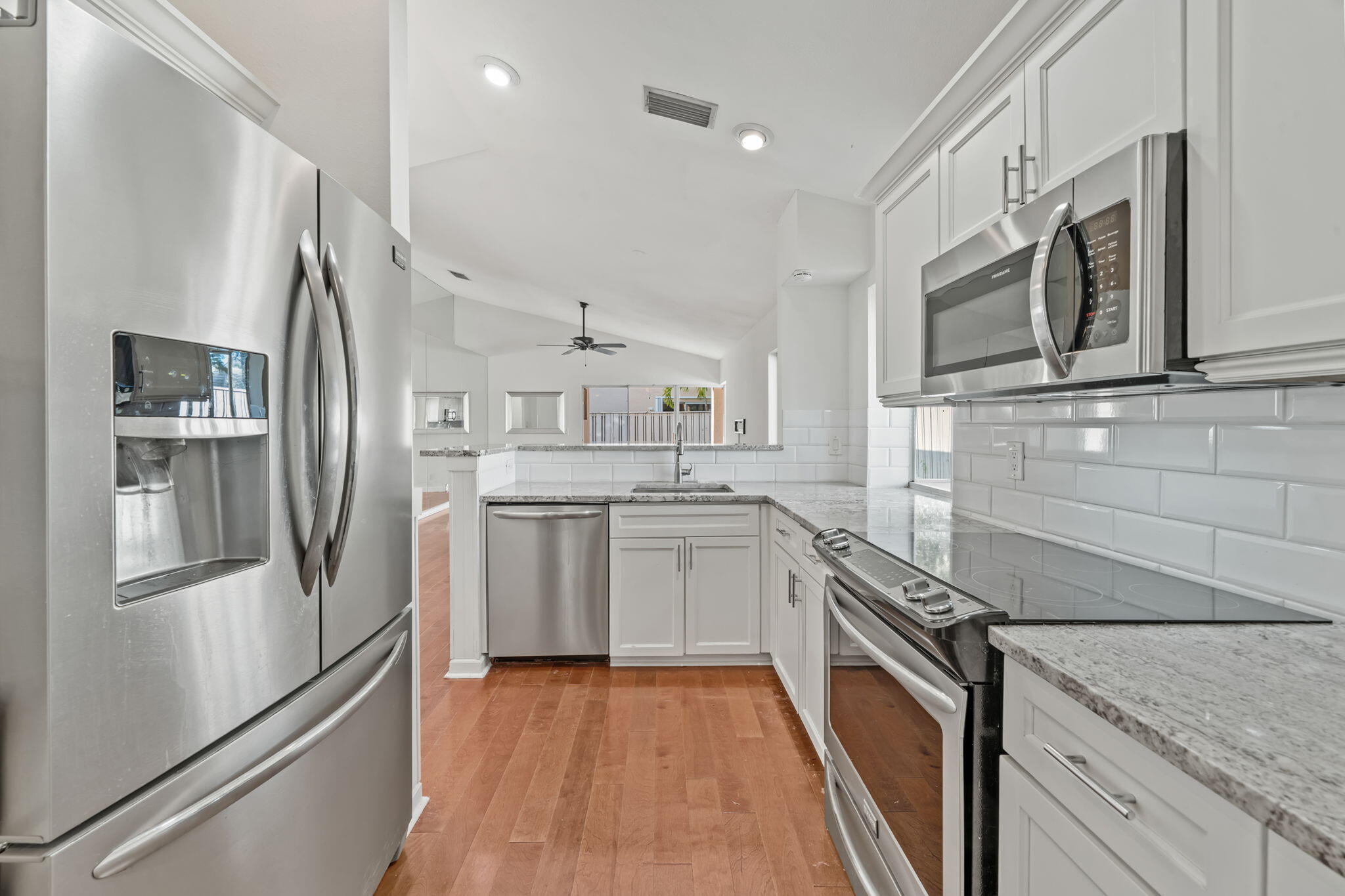Beautifully remodeled single-story home offering 2 bedrooms, 2 bathrooms, and a 1-car garage. Hardwood floors run throughout the home, complemented by cathedral ceilings and an open, airy floor plan. The custom kitchen features granite countertops, stainless steel appliances, and excellent storage, making it both functional and inviting. The spacious primary suite includes a walk-in closet, dual sinks, and a private water closet. Recent upgrades include a 2017 roof, newer A/C system, and a tankless water heater for added efficiency and peace of mind. Step outside to a private, fully fenced backyard with a covered patio--perfect for relaxing or entertaining. Residents also enjoy access to a community pool. HOA fees include basic cable. Perfect Palm Beach Gardens location! Located in the desirable Bristol Club within a sought-after resort-style community, offering world-class amenities including the Honda Classic, five championship golf courses, a renowned spa, sports club, fitness center, tennis courts, croquet, parks, miles of walking trails, and a wide variety of dining and shopping options.

HOA: $254/month | POA: $915/year
