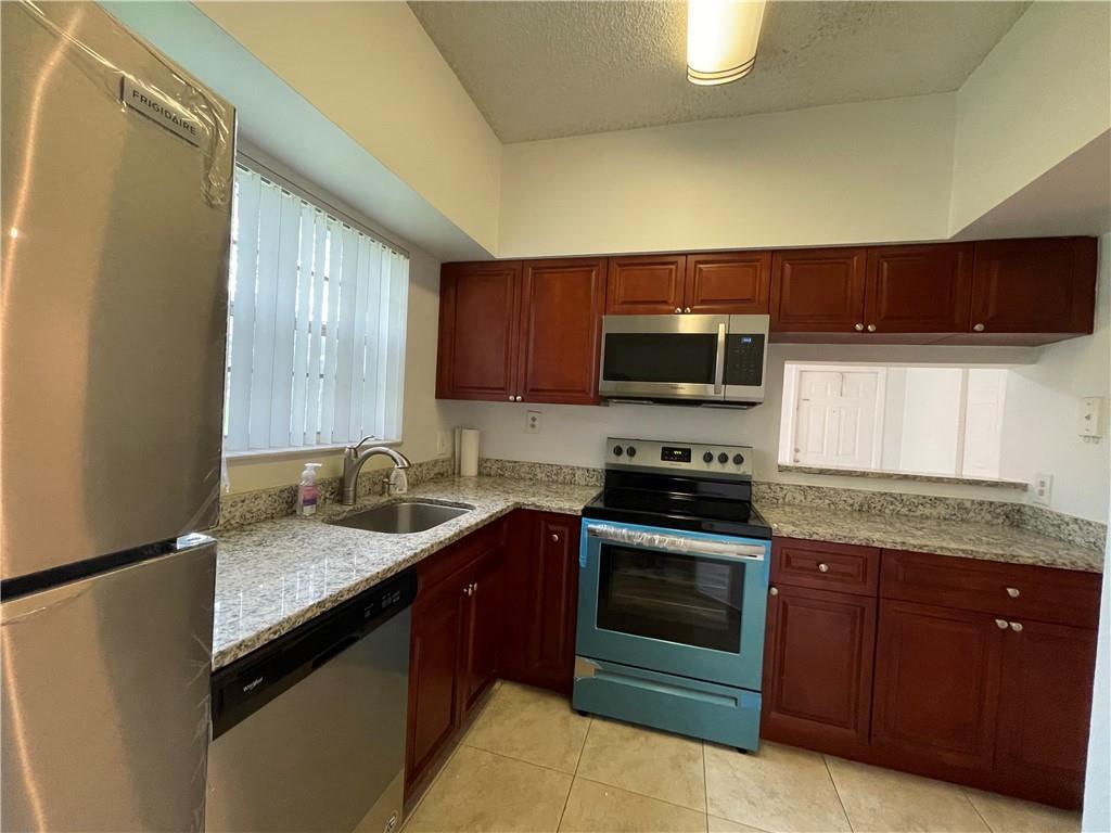 WATERS EDGE AT DEERFIELD CONDO - Residential Lease