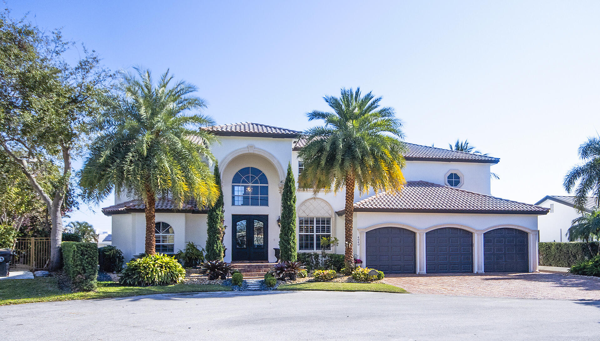 Best value on the water for buyers seeking an expansive luxury family home in prestigious Lighthouse Point. Combining generous living spaces, outstanding waterfront amenities and an unbeatable 119" waterfront location on a quiet cul-de-sac, this exceptional property presents a rare opportunity to enjoy the best of the South Florida lifestyle. Offering nearly 5k sq ft living space thoughtfully designed with ample storage, walk-in closets, two laundry rooms, two master suites, impact windows & doors, updated dock & seawall, gorgeous stone paver patio, Chicago brick driveway and porch with 3-car garage, pool & hot tub with cascading waterfall, outdoor gas fireplace and kitchen, soaring ceilings and more for an entertainer's showplace.