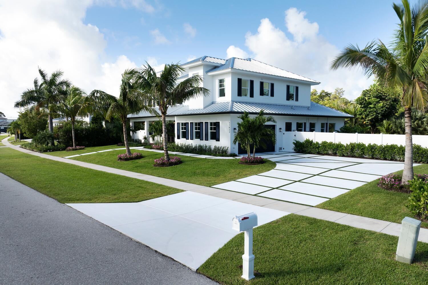A thoughtfully designed custom home in one of Palm Beach Gardens' most sought-after gated communities. This expansive residence features two luxurious primary suites—one on the main level and another upstairs—perfect for multigenerational living or hosting guests. The gourmet kitchen is a chef's dream with Thermador appliances, gas range, butler's pantry, warming drawers, ice maker, second oven, and ample storage. Enjoy elegant dining with a built-in beverage station. Outdoor living includes a summer kitchen, cabana bath, and a private ½-acre lot with water access. A separate apartment above the garage with full kitchen and laundry adds flexibility, while the EV-ready garage completes this exceptional home.