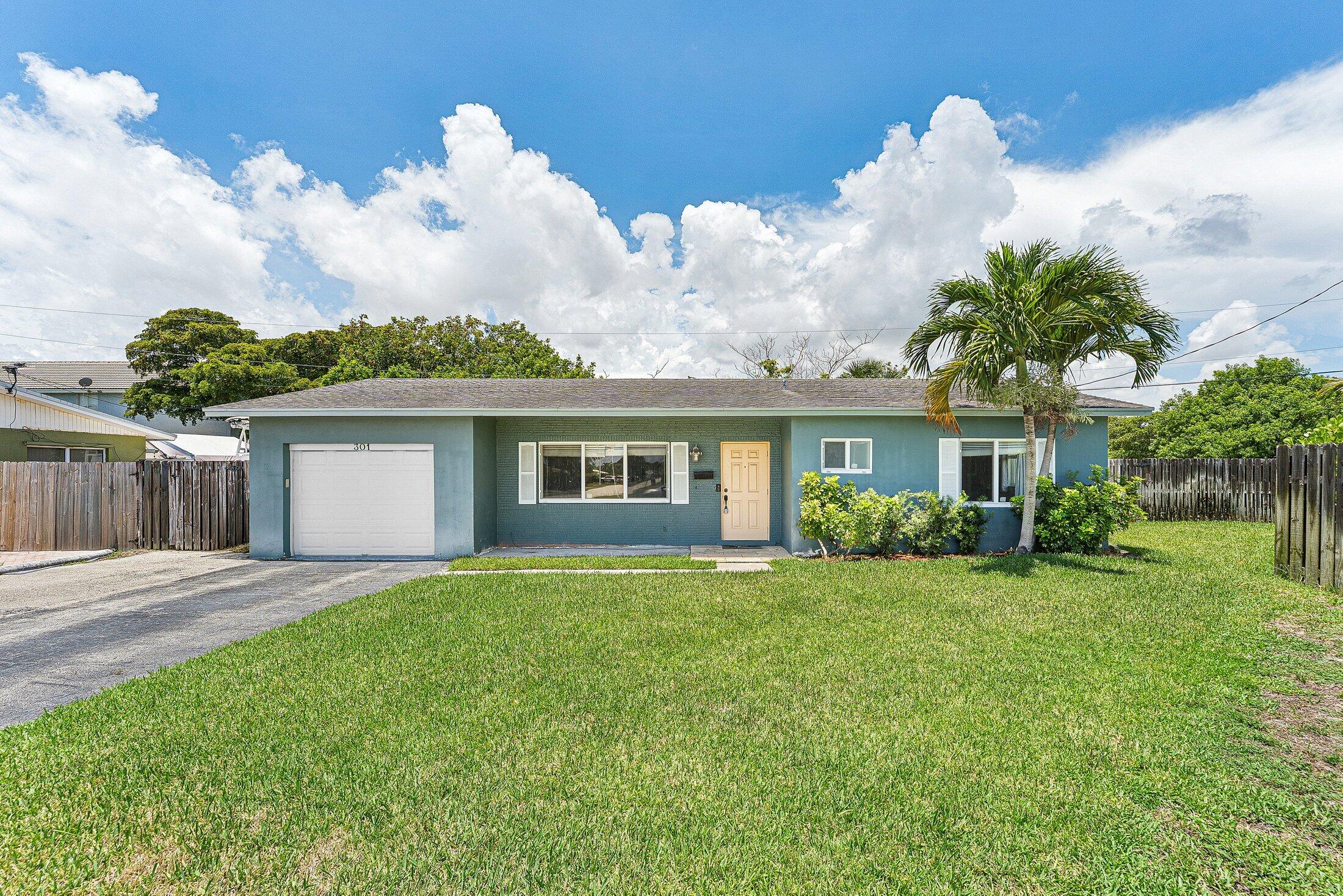 Welcome to this beautifully maintained 2-bedroom, 2-bath home offering nearly 1,700 square feet of spacious living in one of Deerfield Beach's most sought-after neighborhoods. With a flexible floor plan, this home can easily be converted into a 3-bedroom. Enjoy added peace of mind with impact windows and impact doors. Step outside to your own private retreat featuring a sparkling pool, an expansive paver patio, and an enormous fully fenced backyard with endless possibilities. This home combines an unbeatable location, generous indoor and outdoor living space and incredible potential. Whether you're searching for a primary residence, seasonal getaway, or investment property, this is a rare opportunity you won't want to miss!