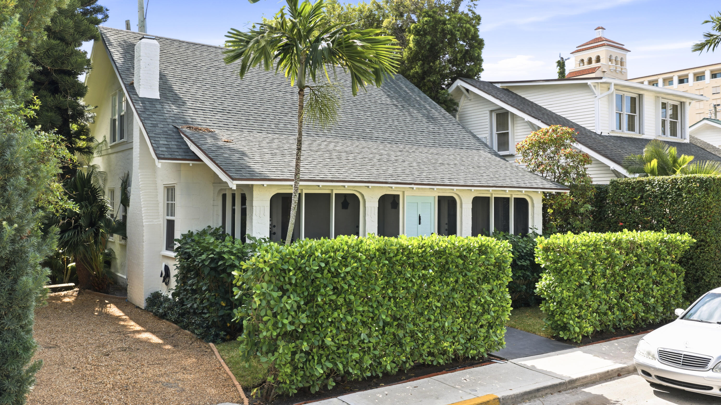 Charming Palm Beach Island cottage with gorgeous Dade County Pine floors and remarkable volume throughout. This 3-bedroom, 2-bathroom home has been extensively renovated while maintaining many original elements that create the distinct Palm Beach Island vibe. Highlighted features include: an enclosed Florida sunroom front porch, hardwood floors, new impact windows, new bathrooms, new kitchen and appliances, new roof with multiple sky- lights, A/C systems, updated electrical, Tesla-charger, back-yard/patio with manicured landscape, and more. A perfect location too - Restaurants, boutiques, markets, beach and the lake trail just a few blocks away.