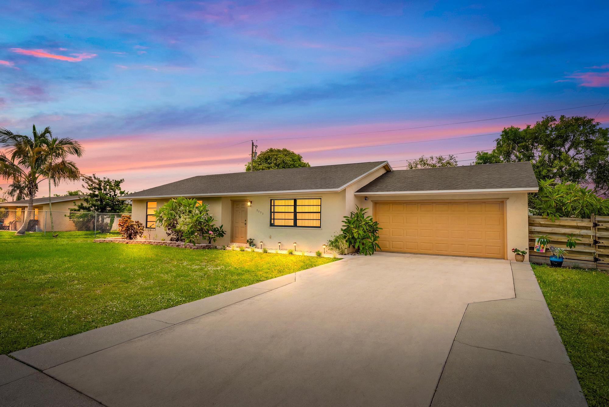 Pride of ownership shines throughout this meticulously maintained, one-owner 3-bedroom, 2-bathroom home situated on a spacious 0.23-acre lot with NO HOA—offering the freedom and flexibility today's buyers are looking for. Bring all your toys! This property features gated side-yard access with plenty of room to park your boat, RV, trailer, or other recreational vehicles, along with an extended two-car garage that provides additional storage and workspace. Enjoy peace of mind with a brand-new roof completed this year, as well as a new roof over the screened-in patio, creating the perfect space for relaxing or entertaining year-round. The fully fenced backyard offers privacy and ample room for pets, play, or future outdoor additions. Inside, you'll find a bright, well-maintained layout featuring an updated kitchen with timeless finishes and a home that has been lovingly cared for by its original owner.  Ideally situated near local schools, shopping, restaurants, and the Florida Turnpike, this home offers exceptional convenience for everyday living. Plus, you're just 15 minutes from Lake Worth Beach, giving you easy access to Florida's beautiful coastline.  With NO HOA, major recent upgrades, RV and boat parking, an oversized lot, and an unbeatable location, this is a rare opportunity you won't want to miss. Schedule your private showing today!