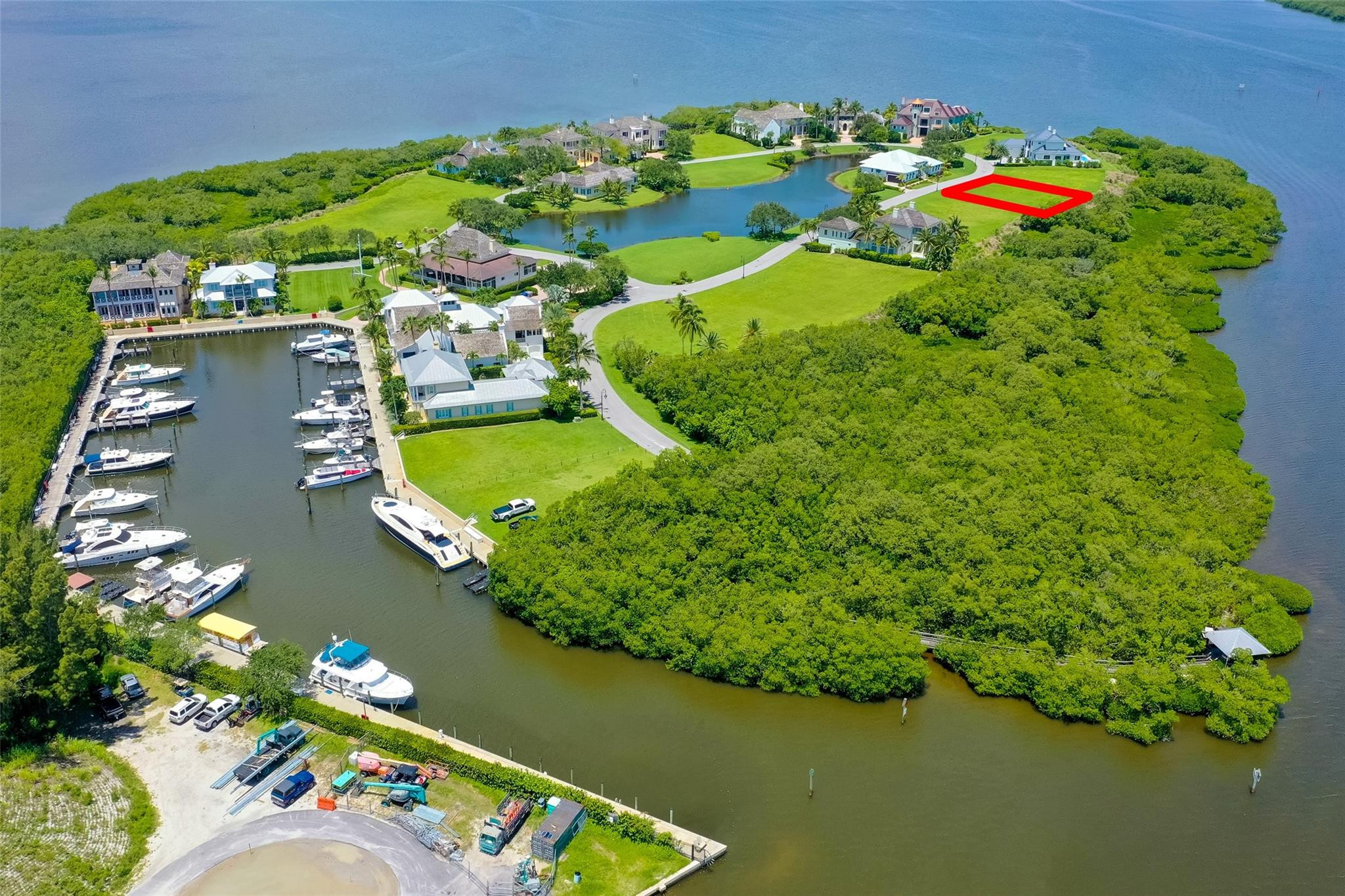 Build your Dream Home in the Exquisite  Marsh Island Yacht Club! Estate Lot includes 65 foot Dock/slip in neighborhood marina with full time Dockmaster + lot/future home site has 102 feet of Eastern Riverfront views, gorgeous Clubhouse and glorious Resort Ambiance! Minutes from Sebastian Inlet & World Class Sport Fishing. Ideal site for your legacy property within the waterfront enclave of Marsh Island. Very few opportunities left to build on riverfront land within the county for under $1m.  Minutes to beaches, Disney resort, Grand Harbor Beach Club & shops/services + more.