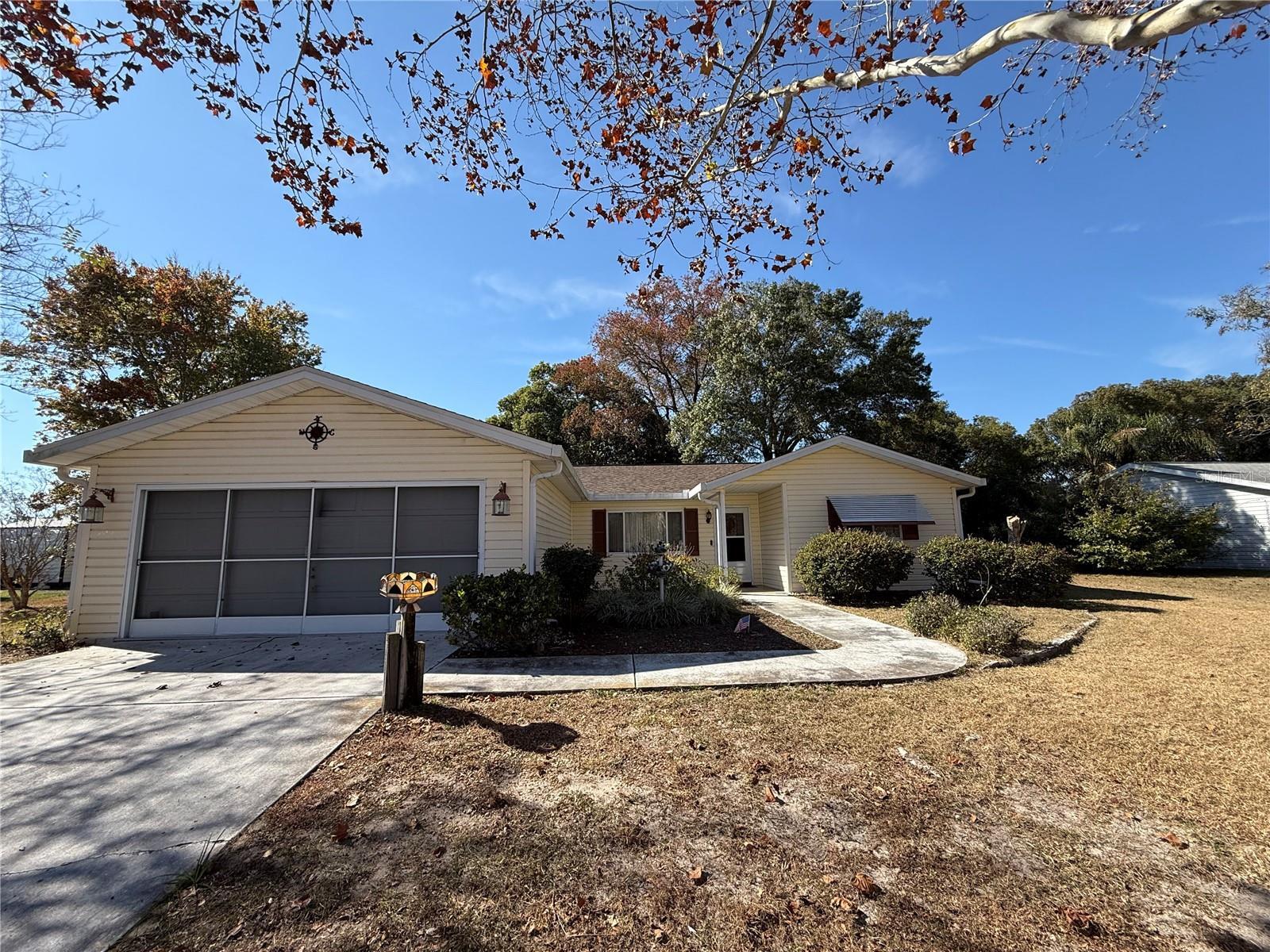 LOCATION!!! LOCATION!!!Beautiful and well kept Home in a 55+ Community. Located in one of Ocala's most peaceful and exclusive areas, this charming 3-bedroom, 2-bath residence offers the perfect balance of comfort, style, and tranquility. Enjoy a screened lanai, two-car garage, and access to community amenities including a relaxing pool and lounge areas — ideal for those who value a calm and enjoyable lifestyle. Live stress-free in a community designed for your comfort, featuring a low HOA fee and a serene environment. Don't miss this wonderful opportunity to live the life you deserve!