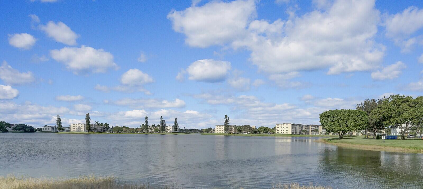Immaculate 2-bed, 2-bath third-floor condo offering  stunning, tranquil lake view. Features include light and  bright, tiled kitchen and dining area, stainless steel range and dishwasher,  new ceiling fans in kitchen, 2nd bedroom and patio, new light fixtures in hallway and bathrooms. The highlight is the private enclosed patio, where you can unwind with sweeping, magnificent lake view. SO SO close to house of worship and clubhouse.    Amenities include internet and WIFI, Century Village is like living in a resort, fitness center, live shows,movies,buses,classes,bingo,card rooms,trips,tennis,pickelball, close to shopping and restaurants,come see and then check out the clubhouse to see it for yourself. Per the association this is a 55 plus community!!!