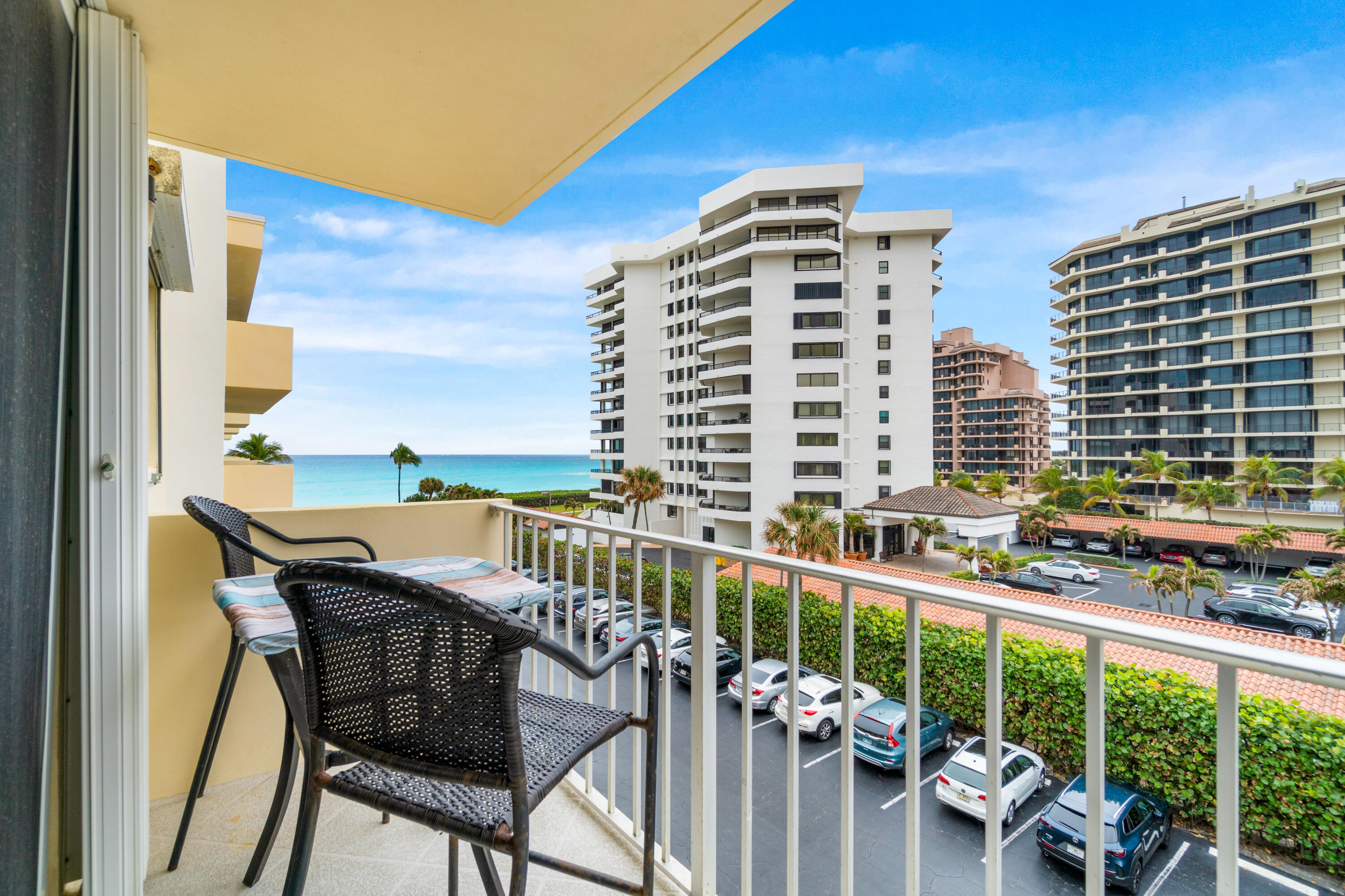 Welcome to this stunning 2-bedroom, 2-bath oceanfront condo in the heart of Juno Beach! Completely updated, this condo features high-end laminate flooring throughout, a beautifully remodeled kitchen with custom white cabinets, a striking glass tile backsplash, new stainless steel appliances, and sleek quartz countertops. Both bathrooms have been thoughtfully updated with quartz counters and white cabinetry. The condo also boasts fresh interior paint, new high-hat lighting, and stylish ceiling fans. The spacious master suite includes a custom walk-in closet. Enjoy the convenience of low COA fees and the ultimate beachside lifestyle, just steps from the sand and nearby shops and dining. Don't miss this opportunity to own a piece of paradise! Roof was redone in 2023!