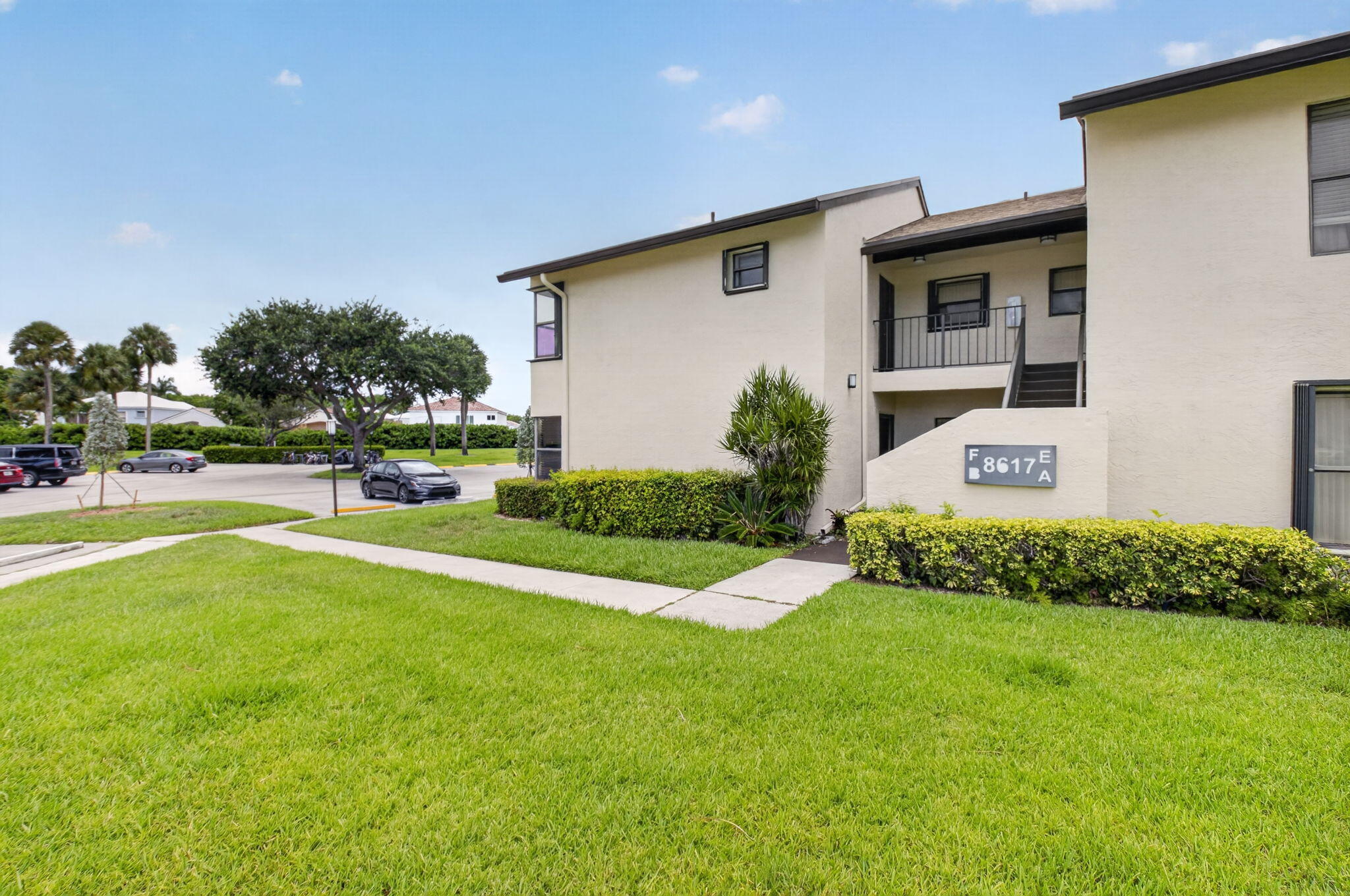 Experience comfort and convenience in this NEWLY RENOVATED 2-bedroom, 2-bathroom condo located in the highly sought-after Boca Glades community.  Situated on the second floor, this bright and airy residence offers a spacious open layout with abundant natural light, creating a warm and inviting atmosphere throughout. HOA FEES PAID QUARTERLY, NOT MONTHLY AND COVER 2 ASSOCIATIONS. CONDO AND MASTER. Totaling approximately $609/month.  The updated Condo features modern light fixtures, sleek countertops, and ample storage perfect for both everyday living and entertaining. The expansive living and dining areas flow seamlessly to a private screened balcony, where you can relax and enjoy tranquil garden views.  The generously sized primary suite includes a large closet and en-suite bathroom, while the additional bedroom provide flexibility for guests, a home office, or growing families. Additional highlights include in-unit laundry, tile flooring in main living areas, Vinyl flooring in bedrooms, and well-maintained finishes throughout.  Residents of Boca Glades enjoy resort-style amenities, including a sparkling community pool, tennis courts, fitness center, clubhouse, and scenic walking paths—all within a gated, beautifully landscaped community.  Ideally located just minutes from top-rated schools, shopping, dining, major highways, and Boca Raton's stunning beaches, this property offers the perfect blend of lifestyle and location.  Whether you're seeking a primary residence, seasonal getaway, or investment opportunity, this is a must-see.