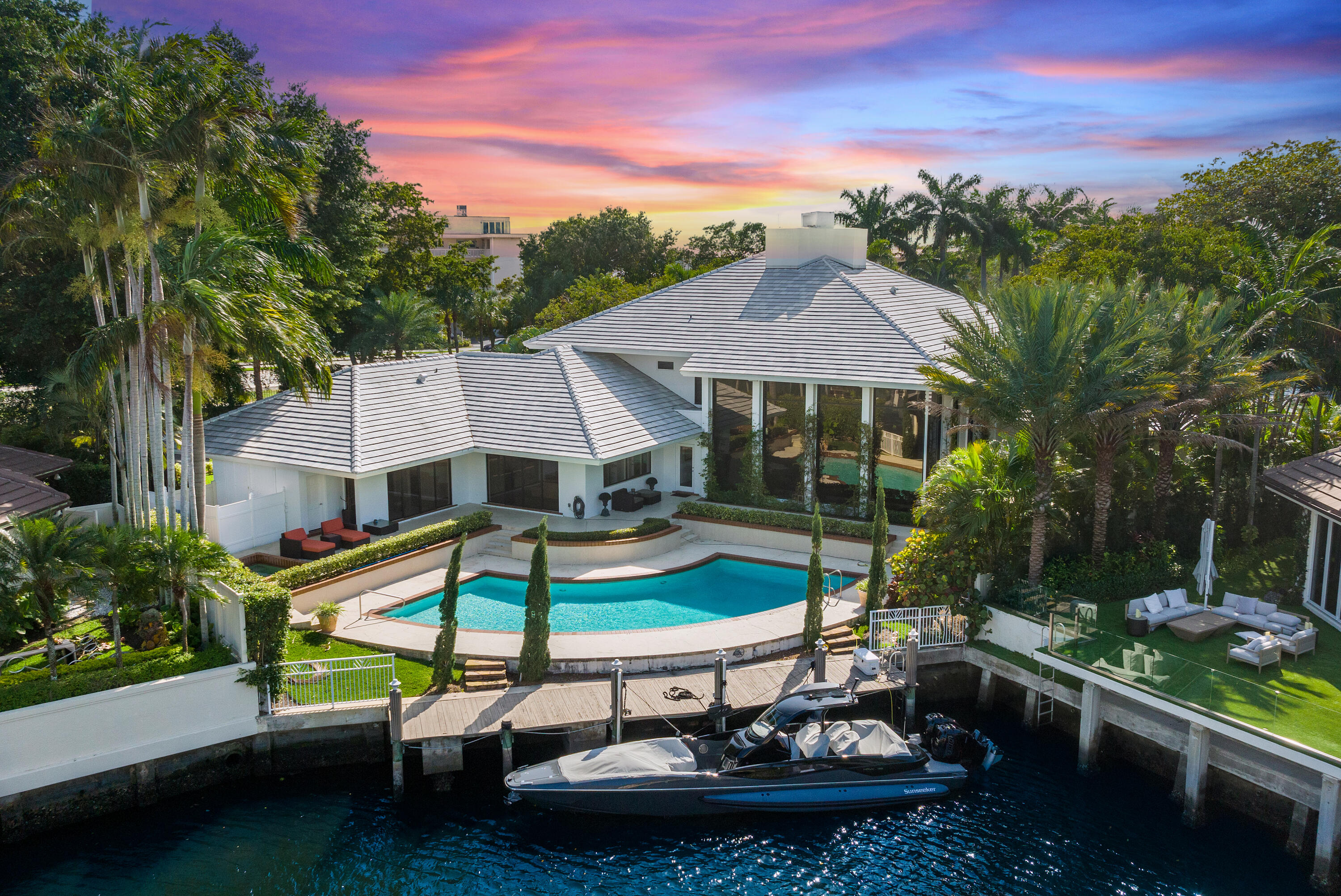 The ultra-exclusive community of The Sanctuary sets the picturesque backdrop for this contemporary waterfront stunner. Boasting over 11,000 total square feet, the architecture in this home dazzles, offering flow through entertaining spaces both indoor and out. The great room draws you in with epic floor to ceiling windows that showcase a long view of the wide canal leading to the intracoastal. Keep your boat at your private dock or in the adjacent 23 slip marina and quickly access the ocean with ease and no fixed bridges. The manned 24-hour guard gate along with 24/7 roving security by both land and water offer the utmost safety and security for you and your family in this 90-residence oasis. Minutes from world-class dining, premium shopping and the Boca Raton airport, this home will surely delight the most discerning buyer. Stay and play within the community at the newly appointed Har-Tru tennis courts, playground and basketball court, or enjoy the half mile walk or bike ride to the idyllic beach. Come see why Forbes rated this community among the top 10 most exclusive in the country - your South Florida dream lifestyle awaits. 

DISCLAIMER: Information published or otherwise provided by the listing company and its representatives including but not limited to prices, measurements, square footages, lot sizes, calculations, statistics, and videos are deemed reliable but are not guaranteed and are subject to errors, omissions or changes without notice. All such information should be independently verified by any prospective purchaser or seller. Parties should perform their own due diligence to verify such information prior to a sale or listing.