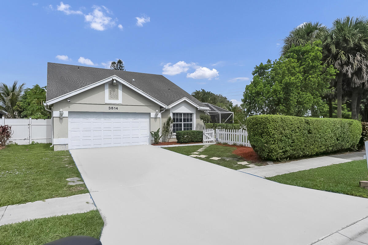 Welcome to this beautifully maintained 3-bedroom, 2-bath home with a dedicated office, situated on a desirable corner lot in West Palm Beach. Enjoy the Florida lifestyle with a screened-in pool and spacious backyard, perfect for entertaining or relaxing. Inside, you'll find vaulted ceilings, granite countertops, stainless steel appliances, and an open, light-filled layout. The spacious primary suite features a walk-in closet and an updated bath with dual sinks, a bidet, and dual showers. Conveniently located near Downtown West Palm Beach, I-95, Palm Beach Outlets, PBI Airport, shopping, dining, and entertainment. A great combination of comfort, style, and location.