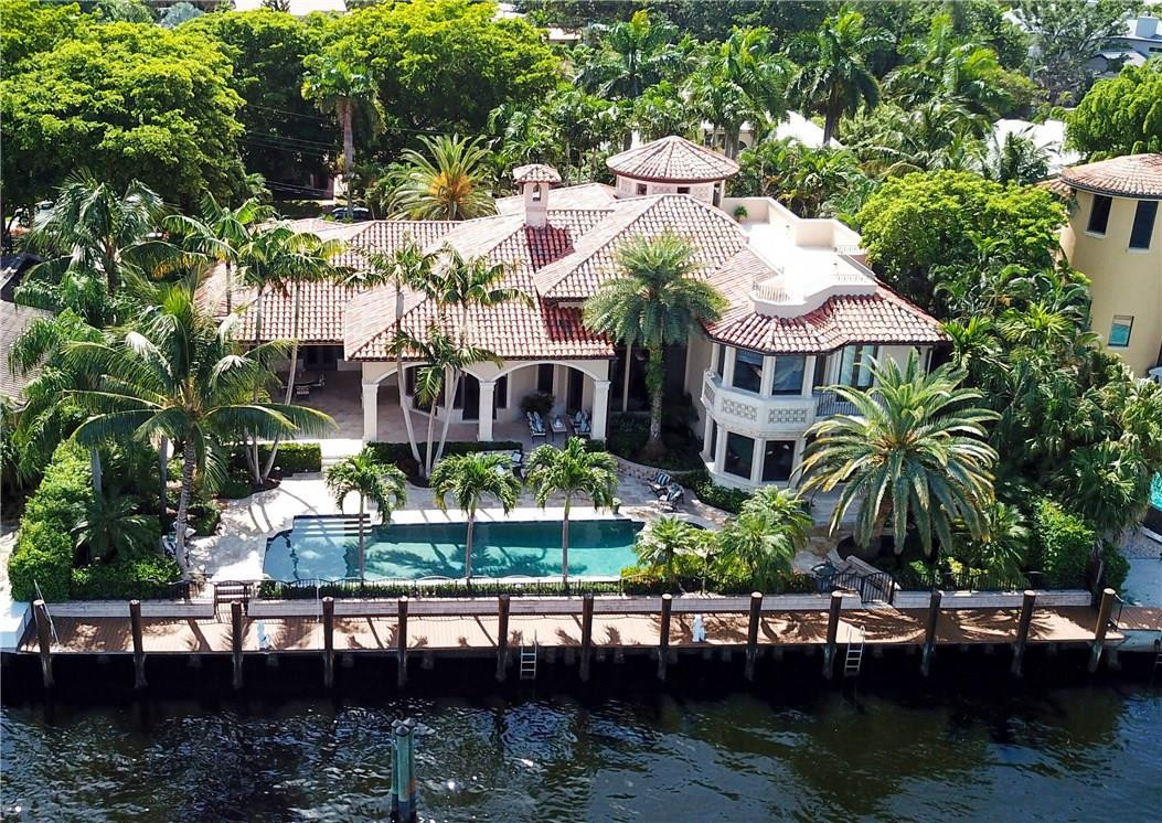 Priced To Sell and truly one of the best opportunities in Harbor Beach. This incredible waterfront estate with panoramic Intracoastal Waterway views is a rare find in the exclusive subdivision of Harbor Beach. Guard house entries, a private beach club, marina & patrolled streets. A boater's paradise 120' of straight line dockage & 2 power stations. A commanding entry with soaring 2 story ceilings, an open flr plan & waterway views from most rms. 1st flr lavish master suite overlooks the pool/spa & waterway. Covered loggias, summer kitchen, roof top terrace. Sq ft from seller.