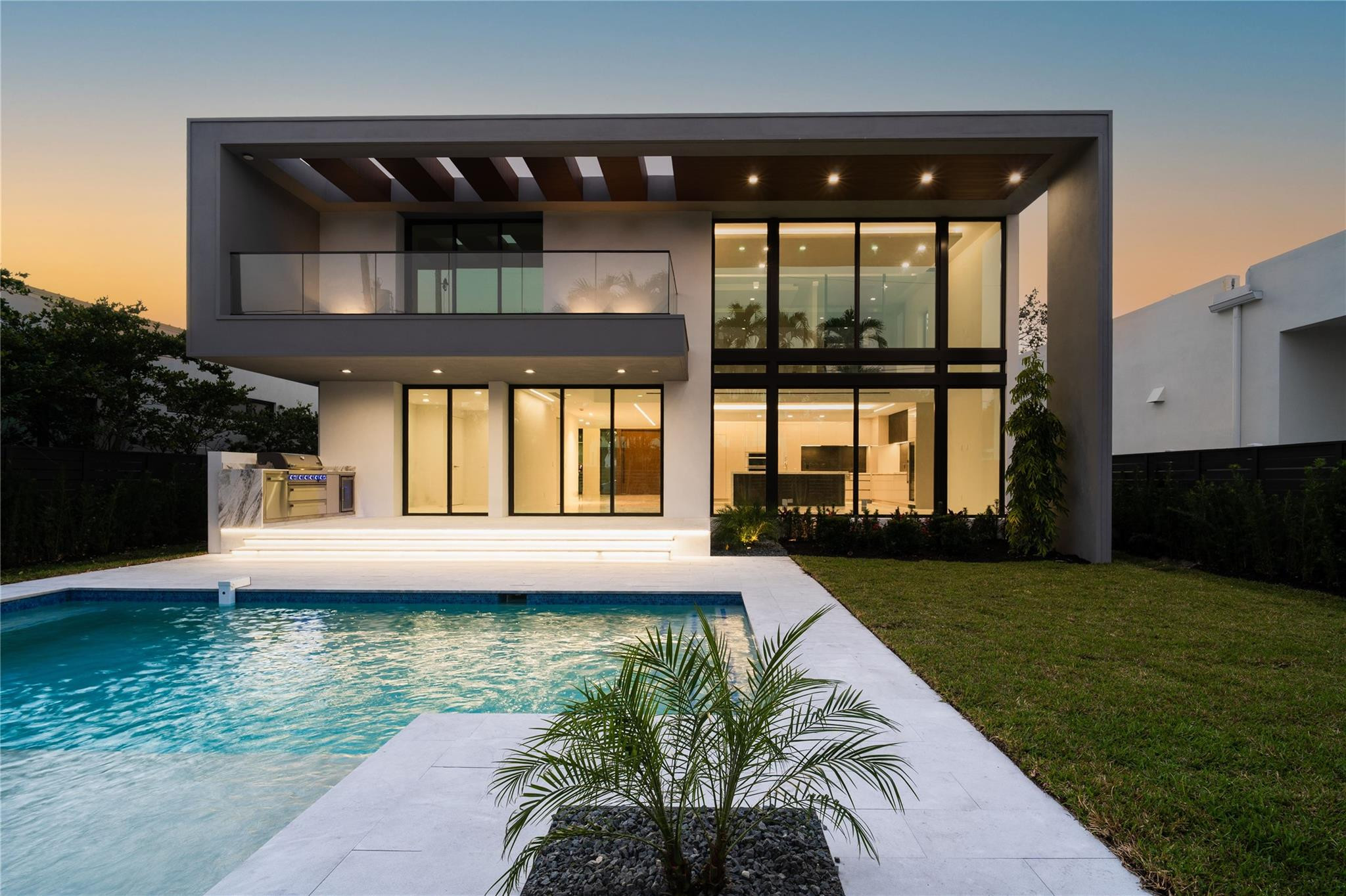 Architectural Modern Masterpiece in Victoria Park Landscaped with exceptional curb appeal, this brand-new 5,217 sq.ft. modern home on an oversized lot makes a striking impression. Built like a custom residence, it blends spacious elegance with cozy warmth - ideal for effortless entertaining. Inside, walls of glass & soaring ceilings fill the open layout with natural light, anchored by the dramatic floating staircase. The kitchen features top-tier appliances & hidden pantry. The home has 4 bedrooms, 4.5 baths & an oversized primary suite with a versatile sitting area that can serve as an office or den, plus a spa-like bath. Outside is a welcoming backyard oasis with pool, outdoor kitchen & lush landscaping, perfect for gatherings. Just minutes from parks, the beach, and Las Olas.   Victoria Park is considered one of Fort Lauderdale's most desirable residential neighborhoods for families due to its tree-lined streets, walkability, neighborhood parks, and convenient access to top schools, downtown Fort Lauderdale, Las Olas, the beach, and major commuter routes. The neighborhood offers a strong sense of community and year-round neighborhood events. Developer NEXT SET: With over 30 years of international real estate experience, the NEXT SET team has delivered landmark residential and mixed-use projects across the UAE, Canada, the United States, and most recently South Florida. Recognized for excellence at every stage — from land acquisition through design, construction, and delivery — NEXT SET creates iconic architectural spaces by blending visionary modern design with strategic planning and uncompromising quality.