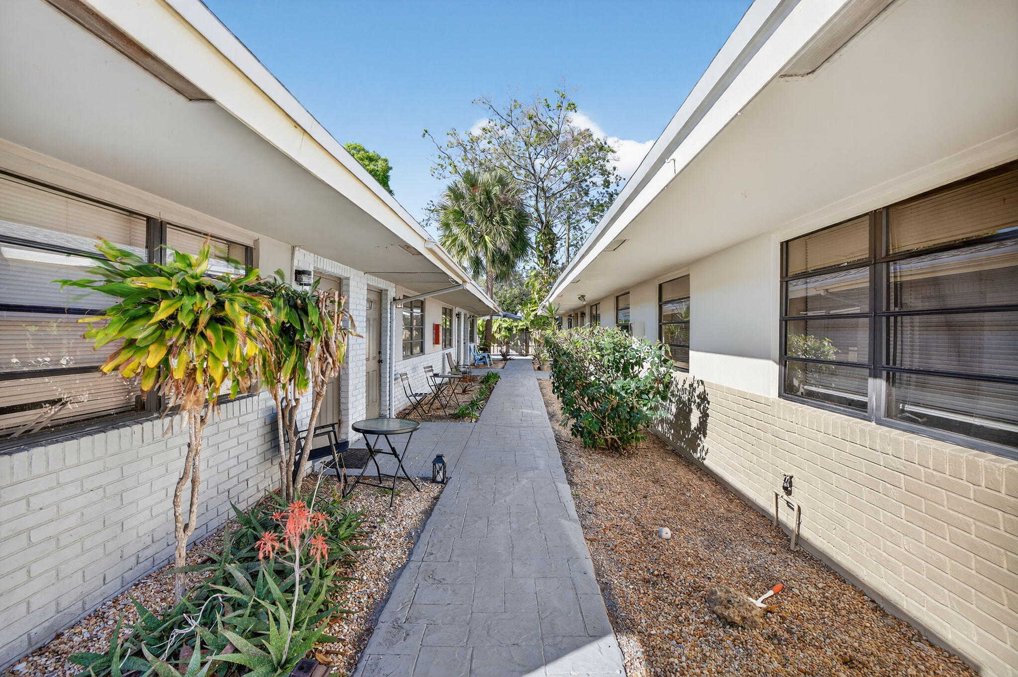 $300 off 2nd month. Welcome to this charming and freshly painted 2-bedroom, 1-bath residence nestled within a quaint boutique community. Light and bright with easy-care tile flooring throughout, this inviting home offers a clean, comfortable layout designed for effortless living.Enjoy the convenience of on-site laundry and assigned parking, plus the added bonus of a pet-friendly community.Perfectly positioned in a prime central location, you're just minutes from shopping, popular restaurants, major highways, the airport, beautiful beaches, and vibrant downtown entertainment. Whether commuting, dining out, or heading to the coast, everything you need is right at your fingertips.Quick approval process and available for immediate move-in — schedule your private showing today before it's gone!