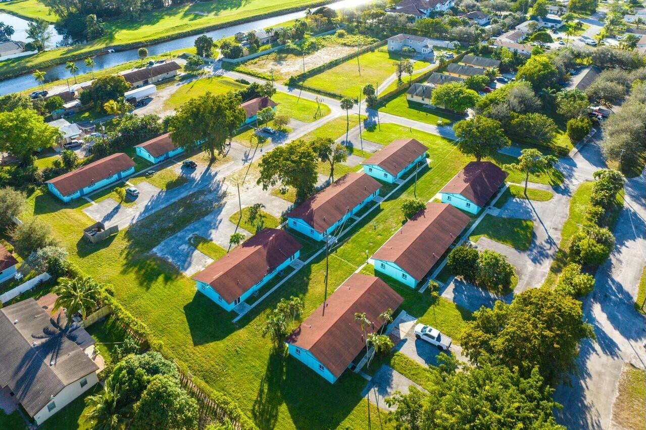 Unique opportunity to purchase 9 duplexes (18 units - 2 bedroom / 1 bath units) totaling 15,599 SF on 3 contiguous parcels totaling 2.79 acres. All units have hurricane impact windows, impact doors and new electrical panels. In addition to AHCA, the properties are licensed by DCF to provide treatment for substance use disorders. The units are one of the few state accredited sites for a Transitional Living program which is also certified by the Florida Association of Recovery Residences (which is required by law). Each duplex has 4 assigned parking spots. Property has fire alarm and camera monitoring system. Please call Broker for additional information. RE Agents please see Broker remarks.