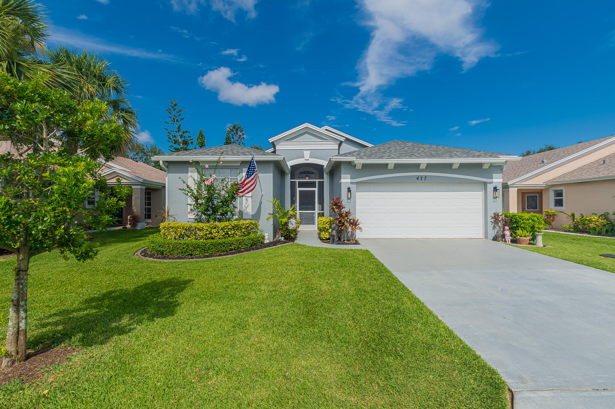 Welcome home to this beautifully maintained 3-bedroom, 2-bath home with a 2-car garage in the gated Lake Forest community of St. Lucie West! Recent updates include a 2025 roof, 2022 A/C, and 2020 gas water heater. The open floor plan features tile throughout the main living areas and wood-look laminate flooring in the bedrooms. Enjoy crown molding, custom dining room woodwork, and a built-in fireplace in the living room. The kitchen offers stainless steel appliances, granite countertops, and a stylish backsplash. The spacious primary suite features a walk-in closet, dual sinks, a Roman tub, and separate shower. Relax on the covered screened lanai overlooking the fenced backyard. Low HOA dues include cable, internet, lawn care and access to 2 clubhouses. Don't miss this exceptional home!