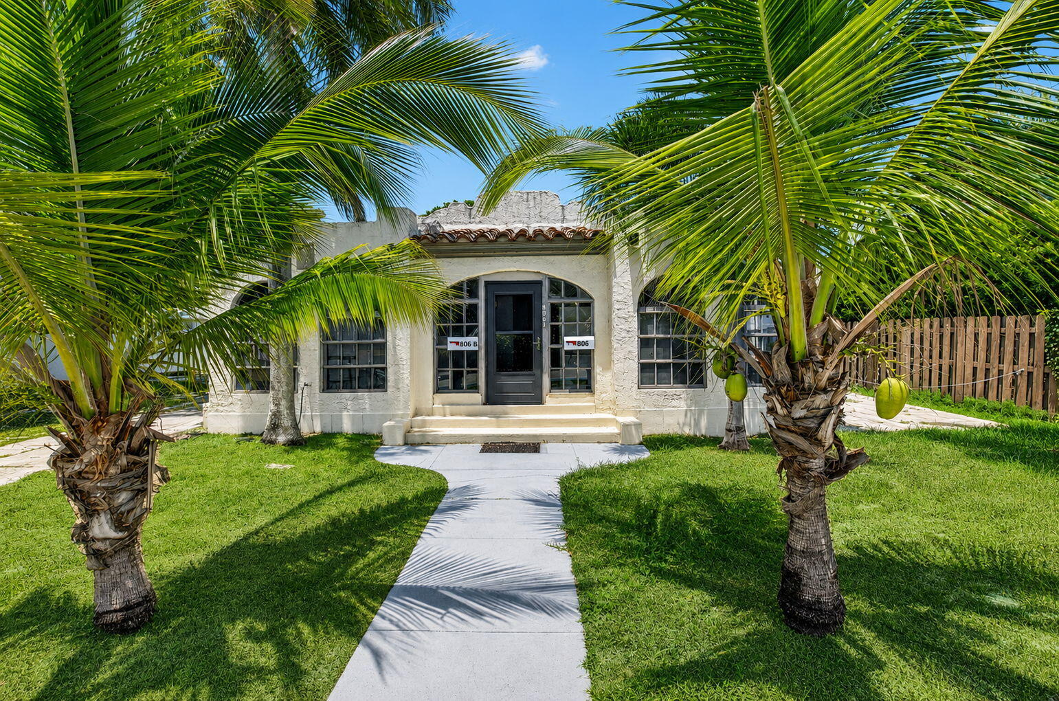 Rare Opportunity in One of Delray Beach's Most Desirable Neighborhoods! Located just 0.9 miles from the beach and only blocks from Atlantic Avenue, this exceptional 0.19-acre property offers endless possibilities in an unbeatable location. Whether you're looking to restore the charm of this classic Old Florida/Mizner-style home or build your dream residence, this property is a true investment opportunity.  The existing home is primed for renovation and is being sold primarily for its incredible location and redevelopment potential. The main residence currently offers 3 bedrooms and 2 bathrooms, while the detached side guest quarters feature 2 bedrooms, 2 baths and a small kitchen, providing additional flexibility for future plans.  Call for additional details. Surrounded by luxury homes and just minutes from Delray's world-class dining, shopping, entertainment, and beautiful beaches, opportunities like this are becoming increasingly rare. Call listing agent for zoning information, building options, and setback details. Property is being sold As-Is.