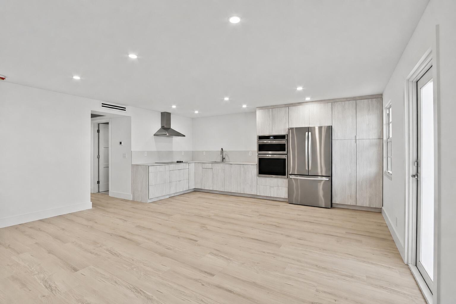 Welcome to this beautifully remodeled 2-bedroom, 1.5-bath, lake- side condominium in the desirable 55+ community of Guildford at Century Village. Thoughtfully renovated from ceiling to floor, this move-in-ready home features stylish finishes throughout, creating a bright, modern, and inviting living space.  Enjoy an open, refreshed interior with updated flooring, a beautifully renovated kitchen, upgraded bathrooms, and contemporary fixtures that make everyday living effortless. Relax on your private patio with lake views or take advantage of Century Village's resort-style amenities, including pools, clubhouse, fitness center, social activities, and more—all within a secure, gated community.