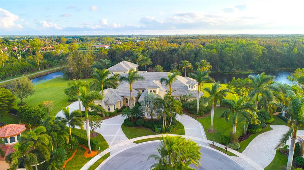 Newly redone estate home on a double lot just footsteps from the horse show! 
Largest lot in the Equestrian Club.